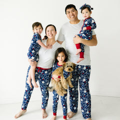 Family of five and a dog wearing Star Spangled matching pjs