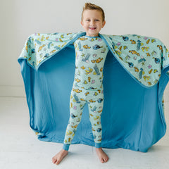 Child in Disney & Pixar Swimming with Nemo pajamas and matching Cloud Blanket