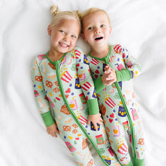 two siblings wearing matching Snack Attack zippies