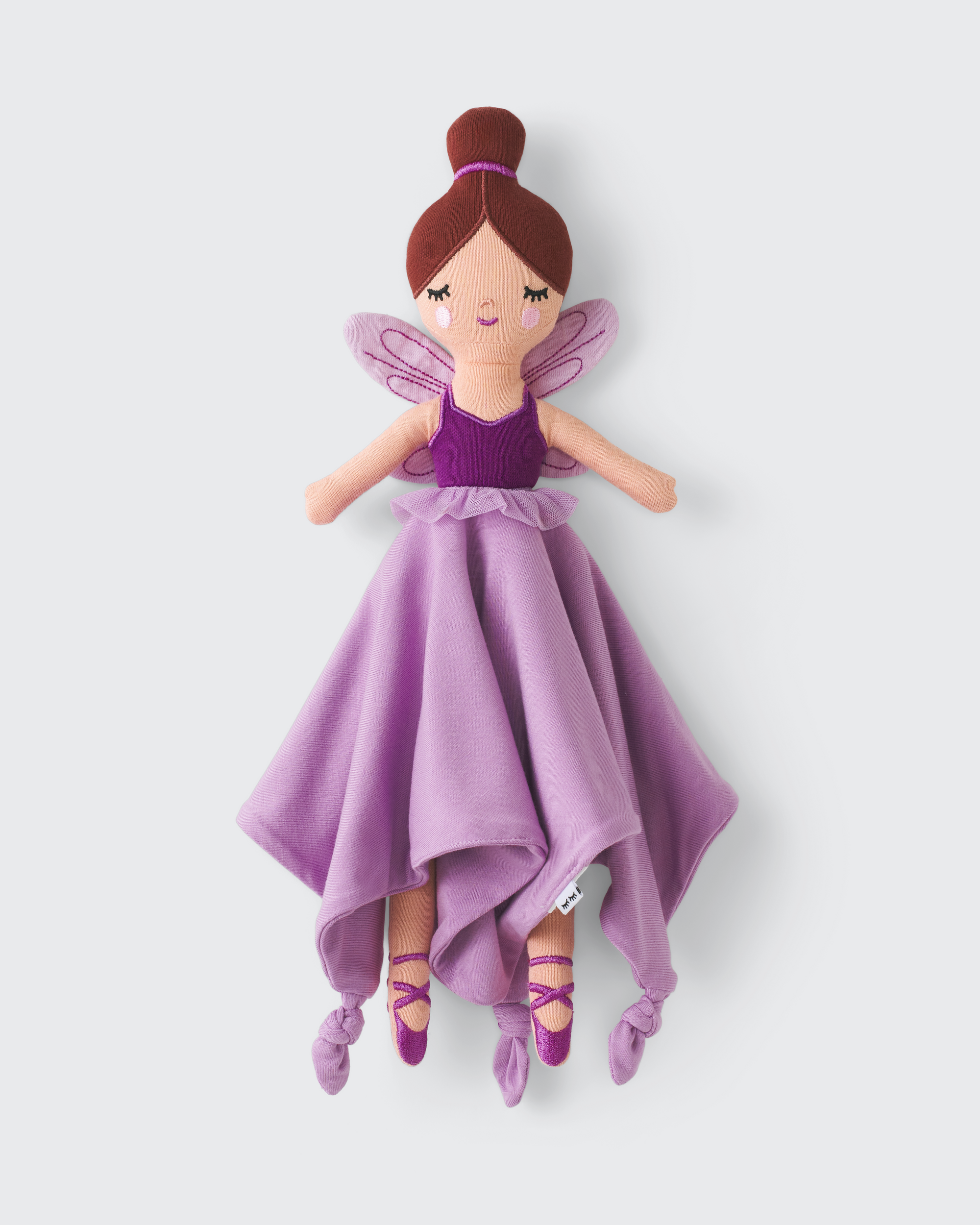 Flat lay of the Marie the Sugarplum Fairy Sleepyhead Lovey