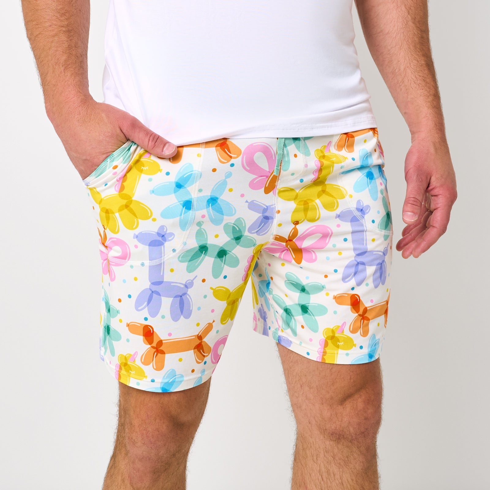Close up of man wearing the Balloon Bash Men's Pajama Shorts