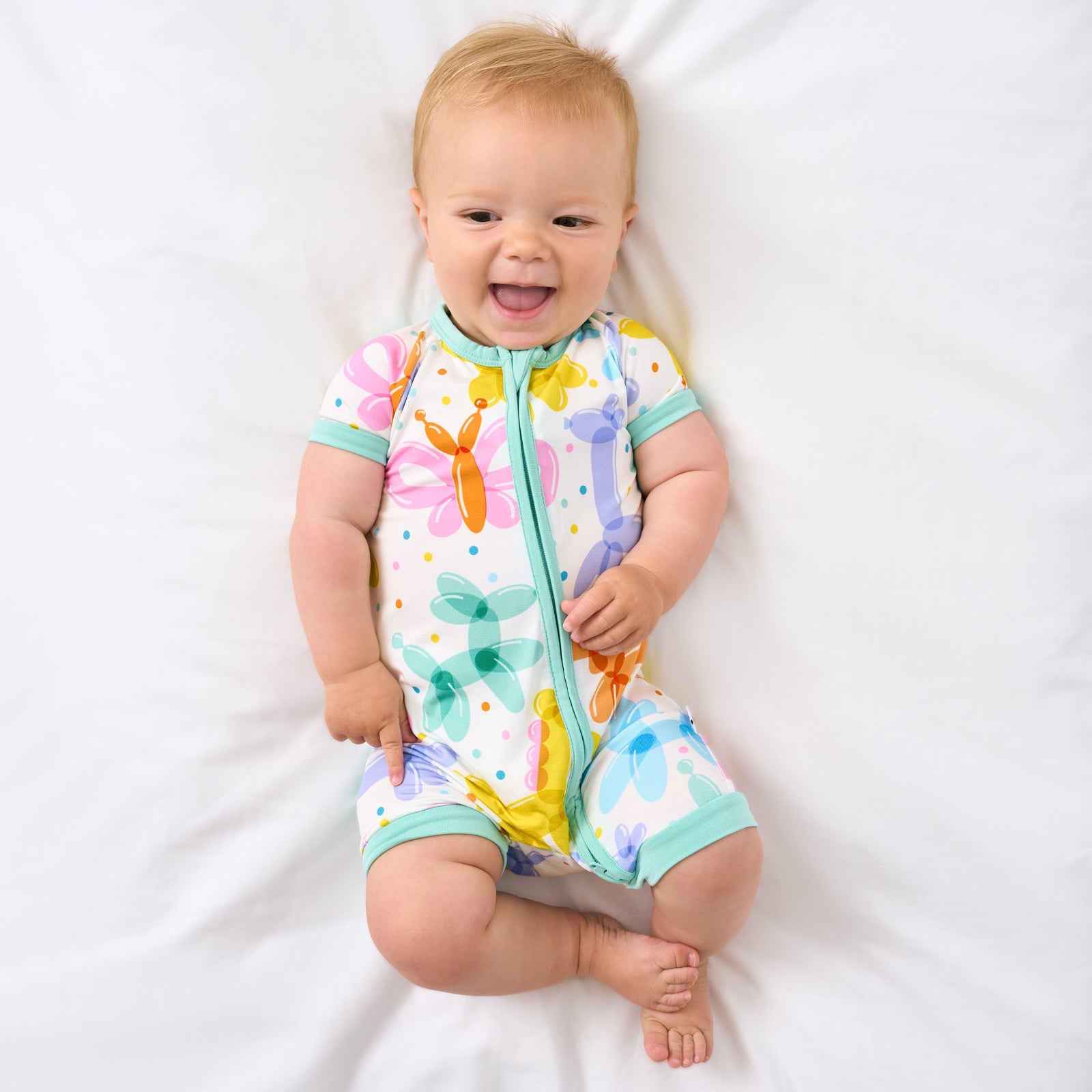 Aerial view of child wearing the Balloon Bash Shorty Zippy