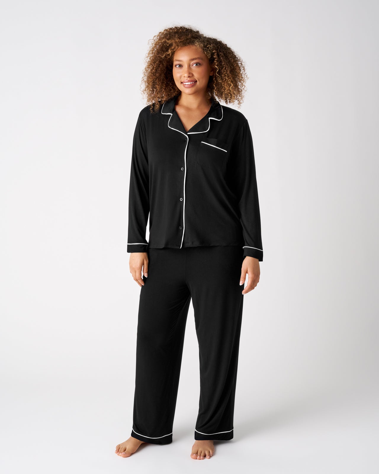 Woman wearing the Black Women's Long Sleeve Pajama Set