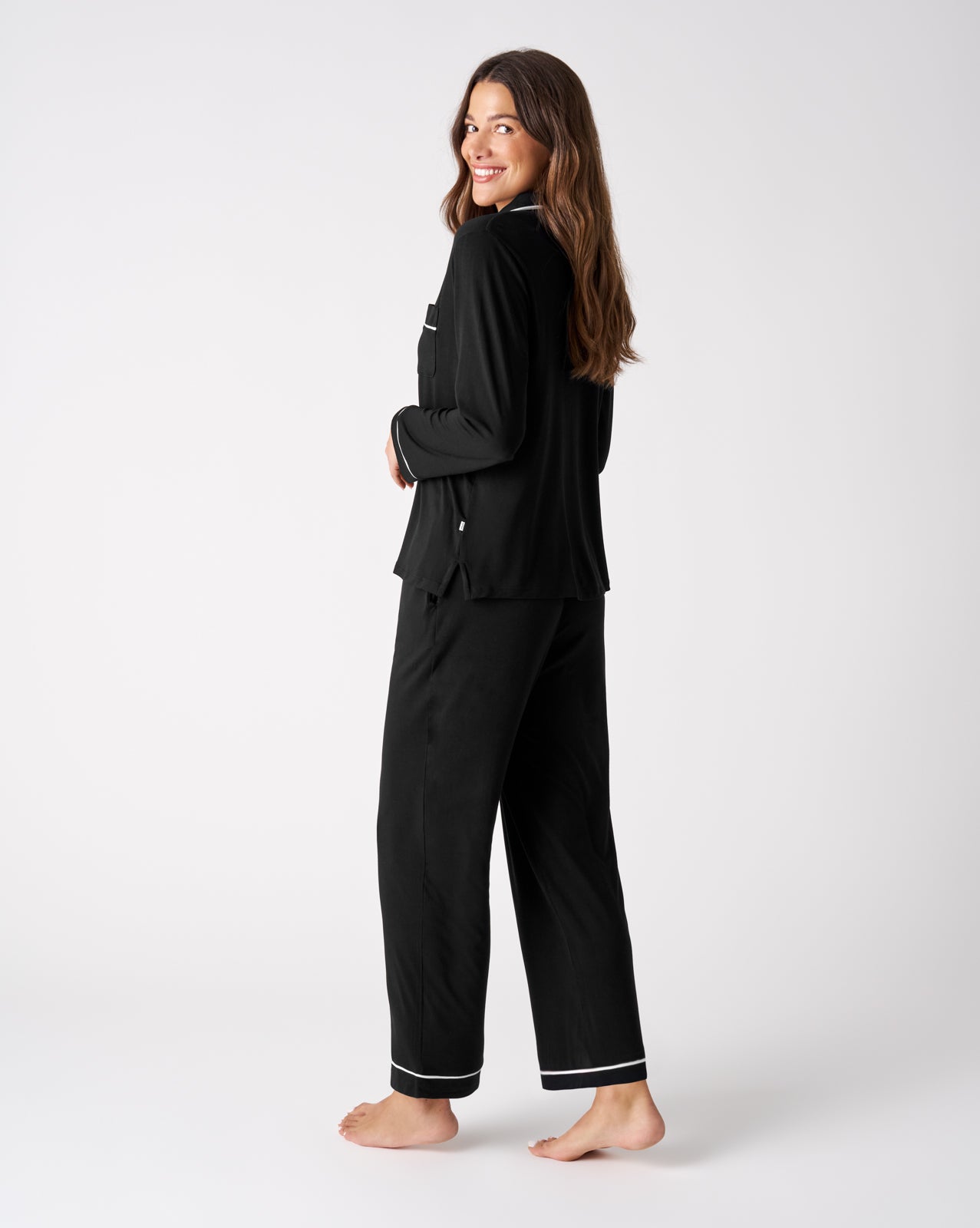 Back view of woman wearing the Black Women's Long Sleeve Pajama Set