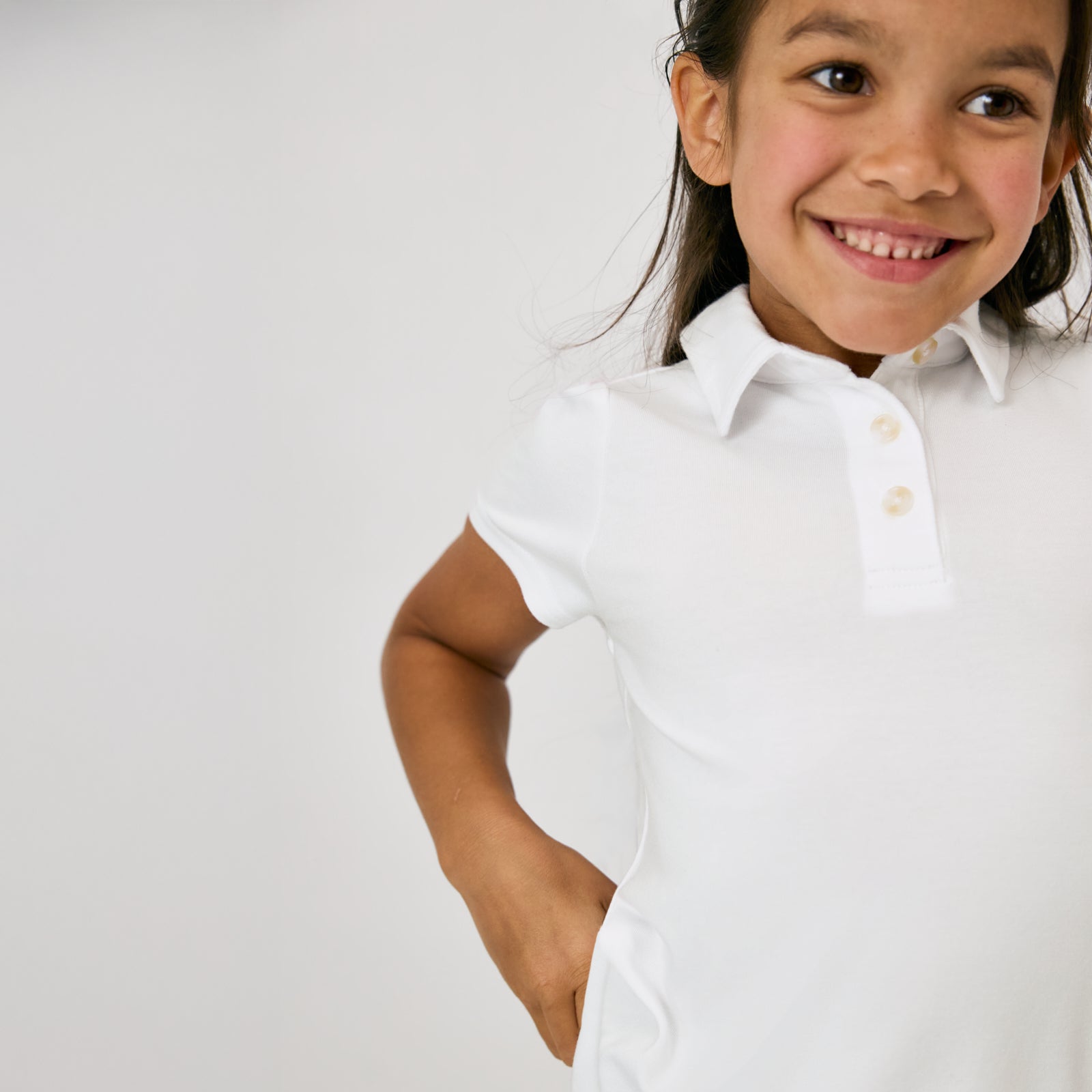 Close up of the collar detail on the Bright White Puff Sleeve Polo