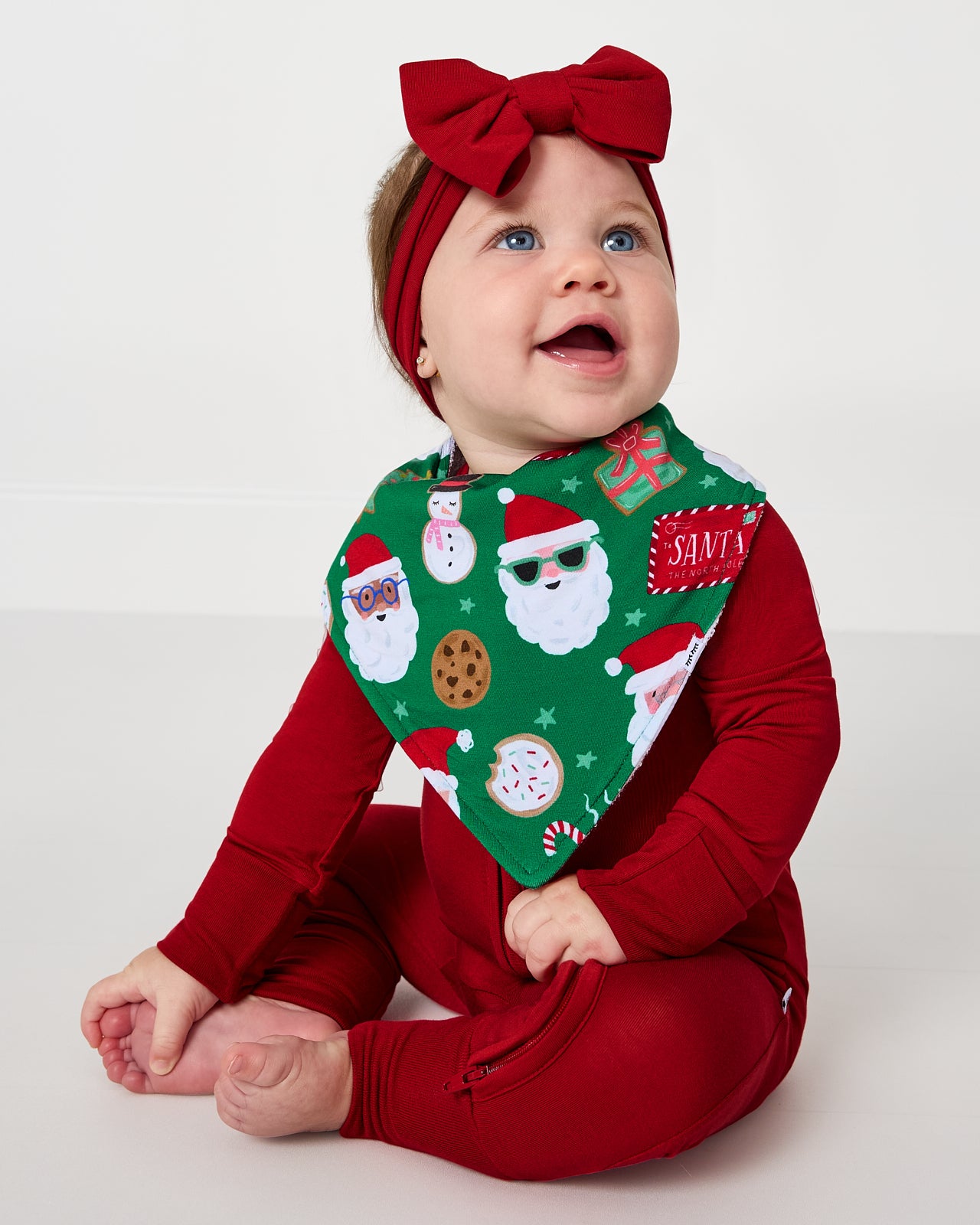 Baby wearing the Cookies for Santa Bandana Bib