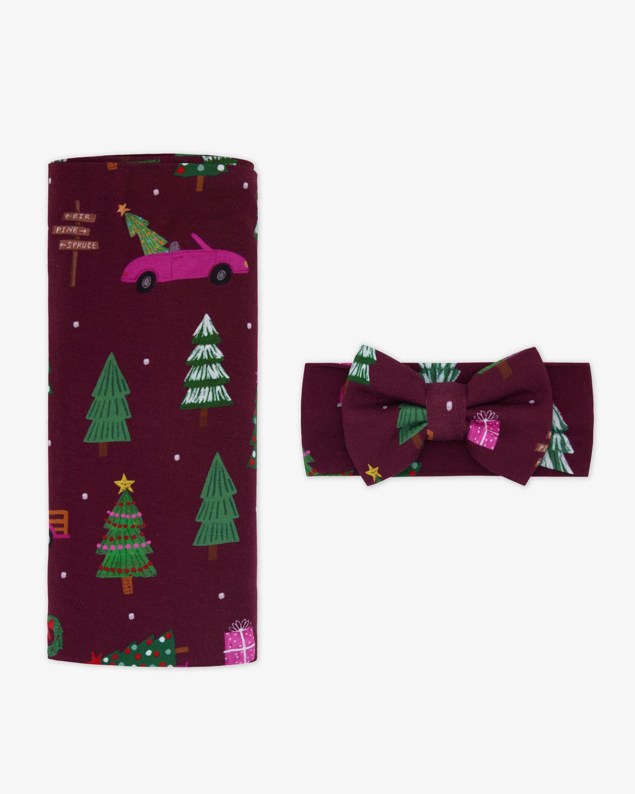 Flat lay of the Cranberry Tree Traffic Swaddle & Luxe Bow Headband Set