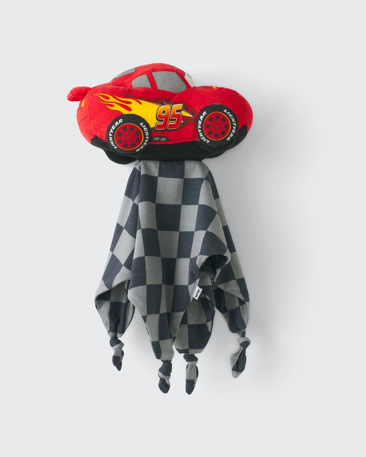 Flat lay of the Disney & Pixar Lightning McQueen Lovey
