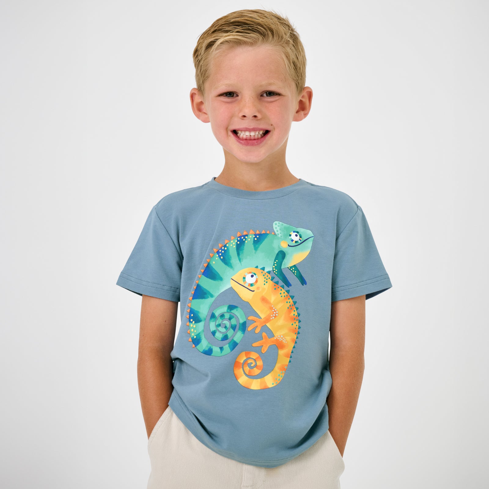 Standing child wearing the Chameleon Relaxed Tee
