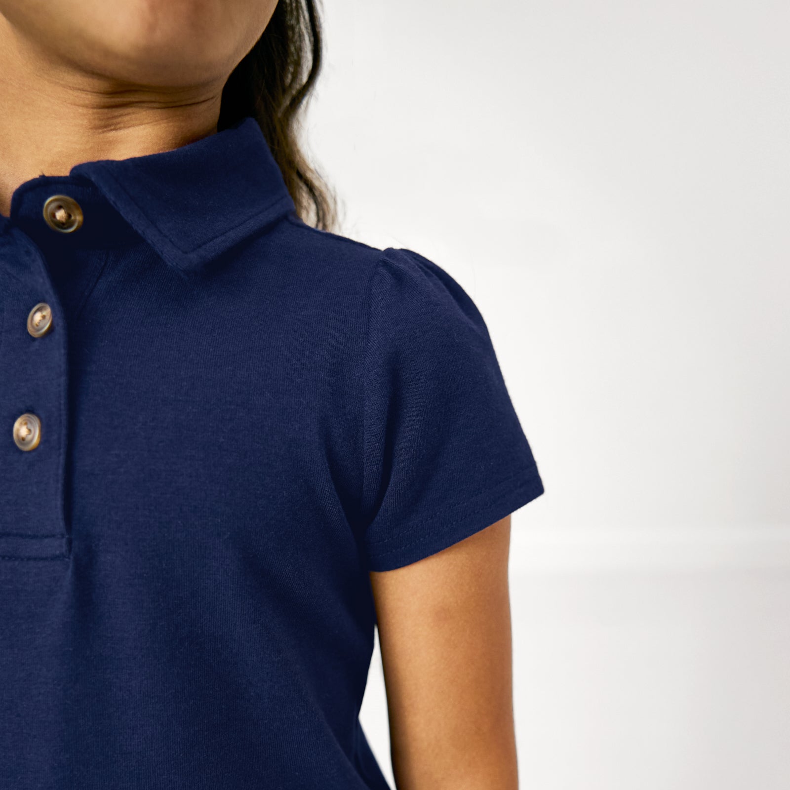 Close up of the puff sleeve detail on the Classic Navy Puff Sleeve Polo
