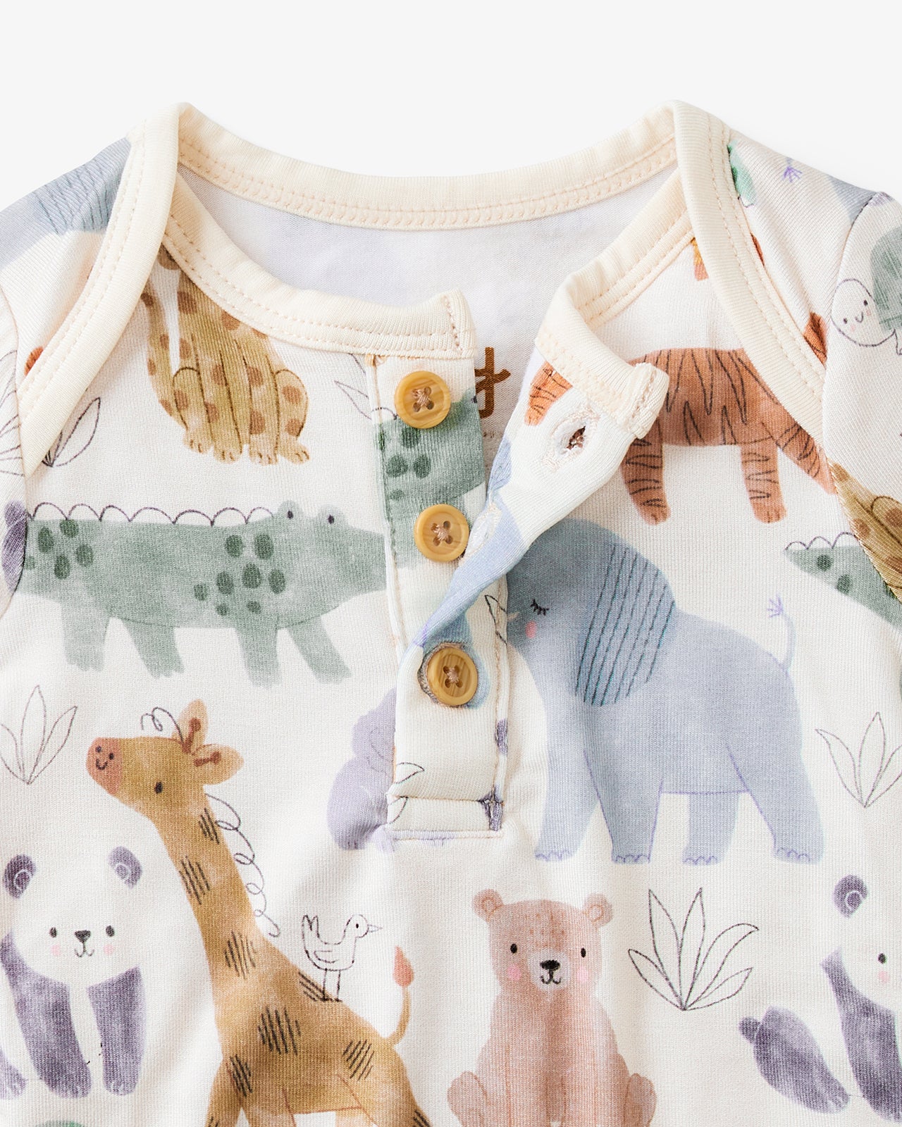 Close up of the button detail on the Sweet Safari Henley Bodysuit