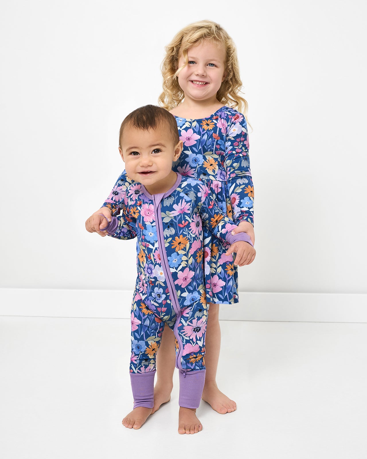Two children wearing matching Dusk Blooms styles