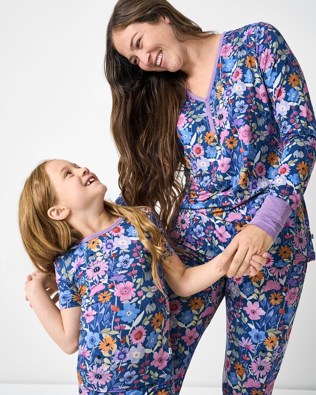 Mother and daughter wearing matching Dusk Blooms bamboo pajamas