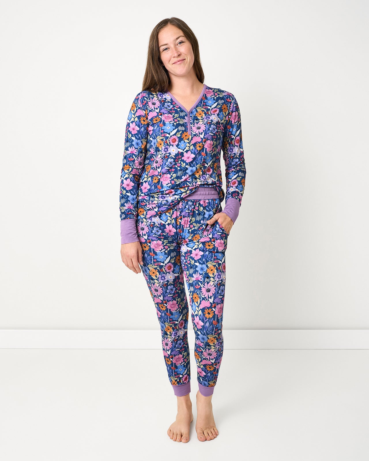 Woman wearing the Dusk Blooms Women's Pajama Pants and Top