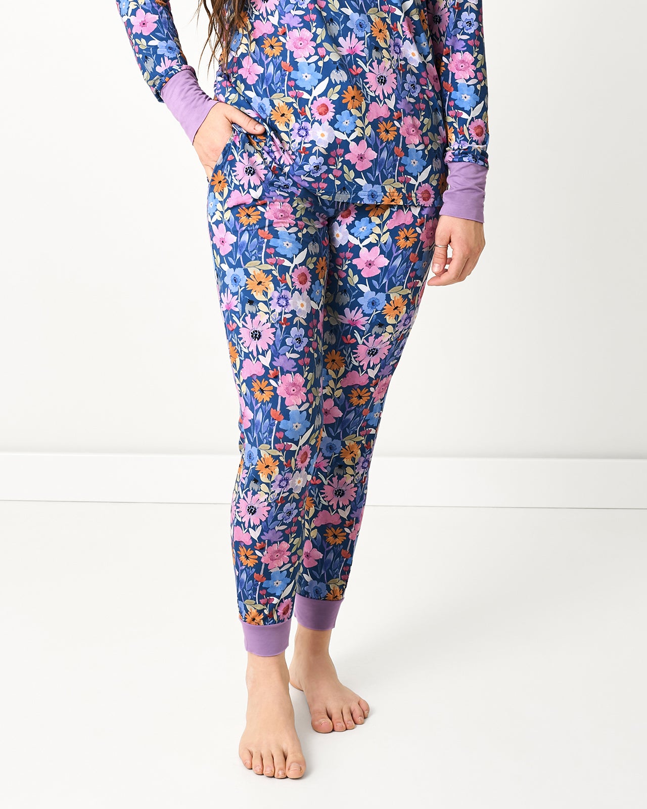 Woman wearing the Dusk Blooms Women's Pajama Pants