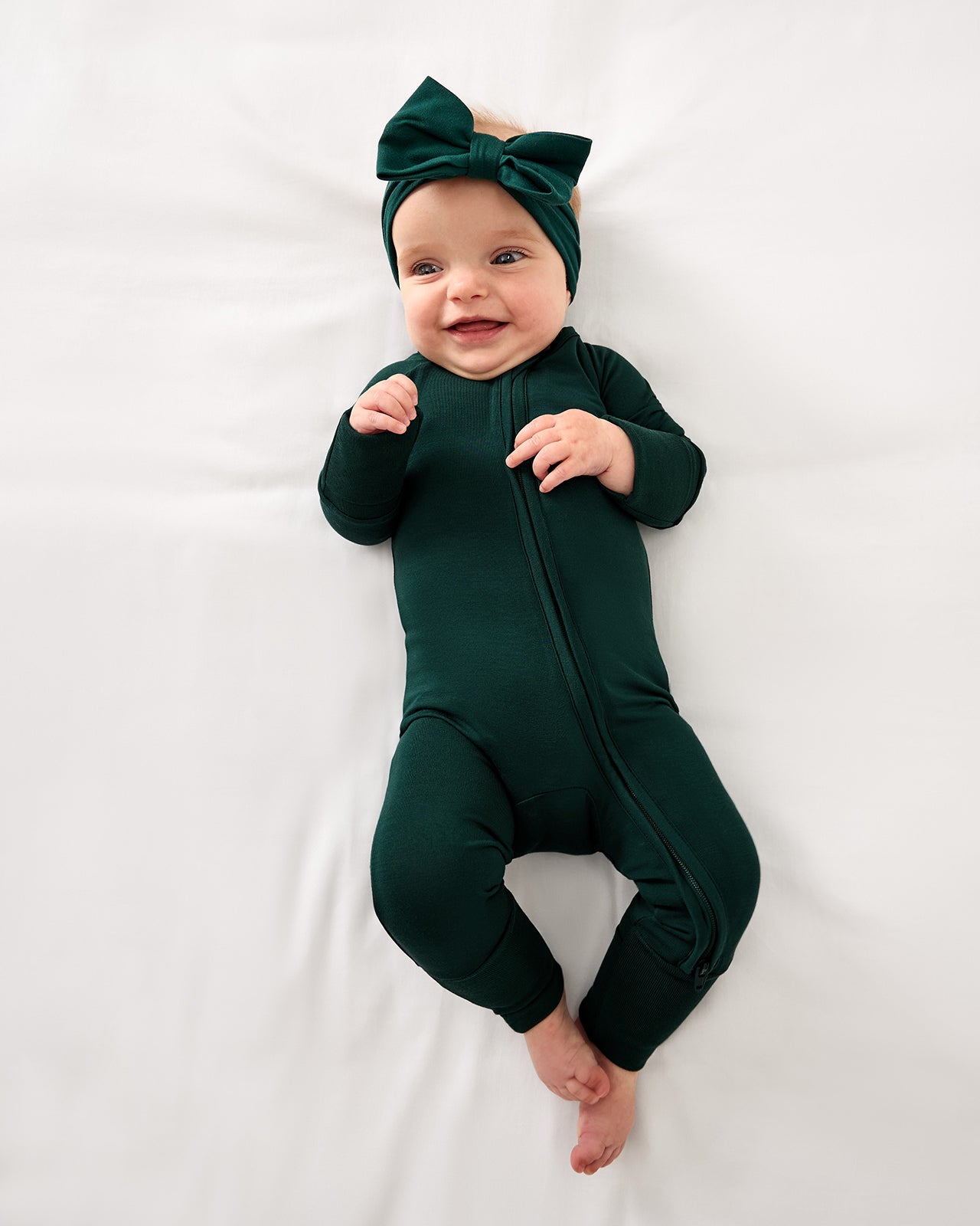 Aerial view of baby wearing the Emerald Zippy