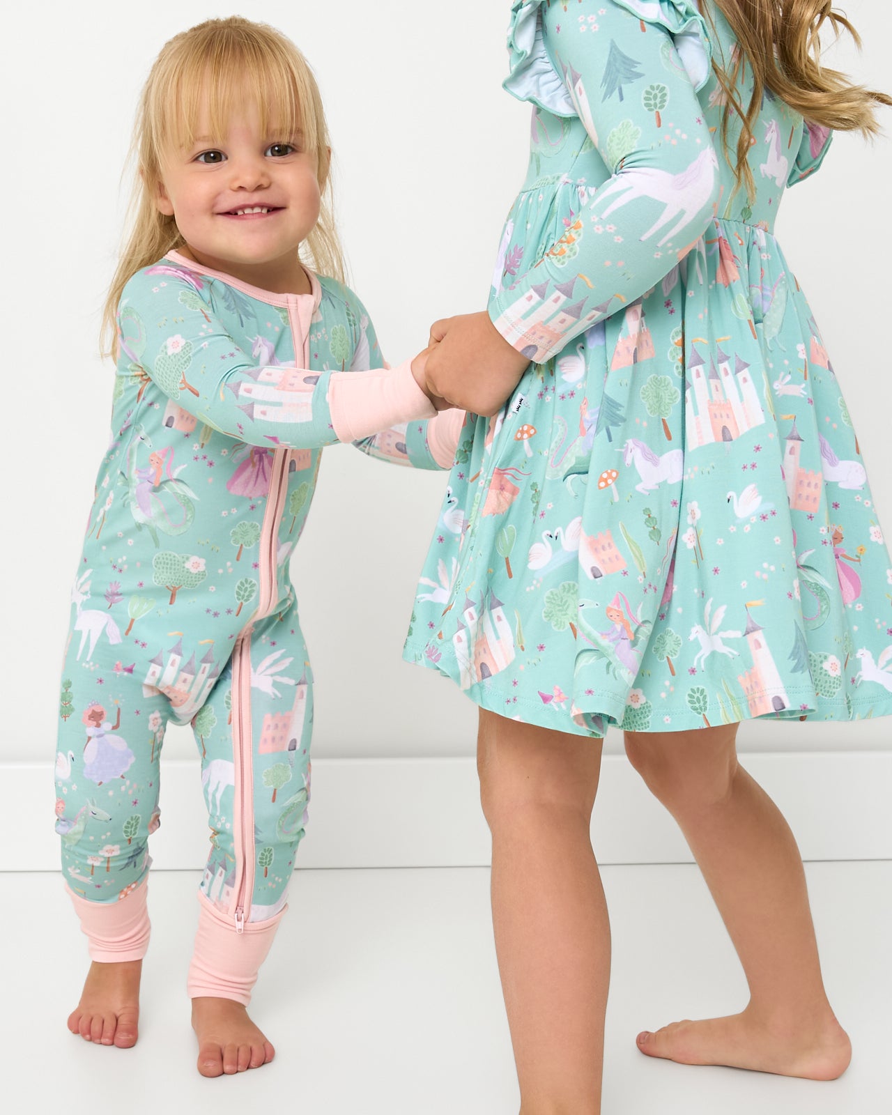 Two girls wearing matching Enchanted Fairytale styles