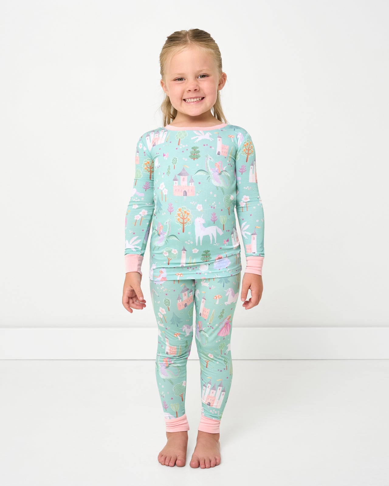 Standing girl wearing the Enchanted Fairytale Two-Piece Pajama Set