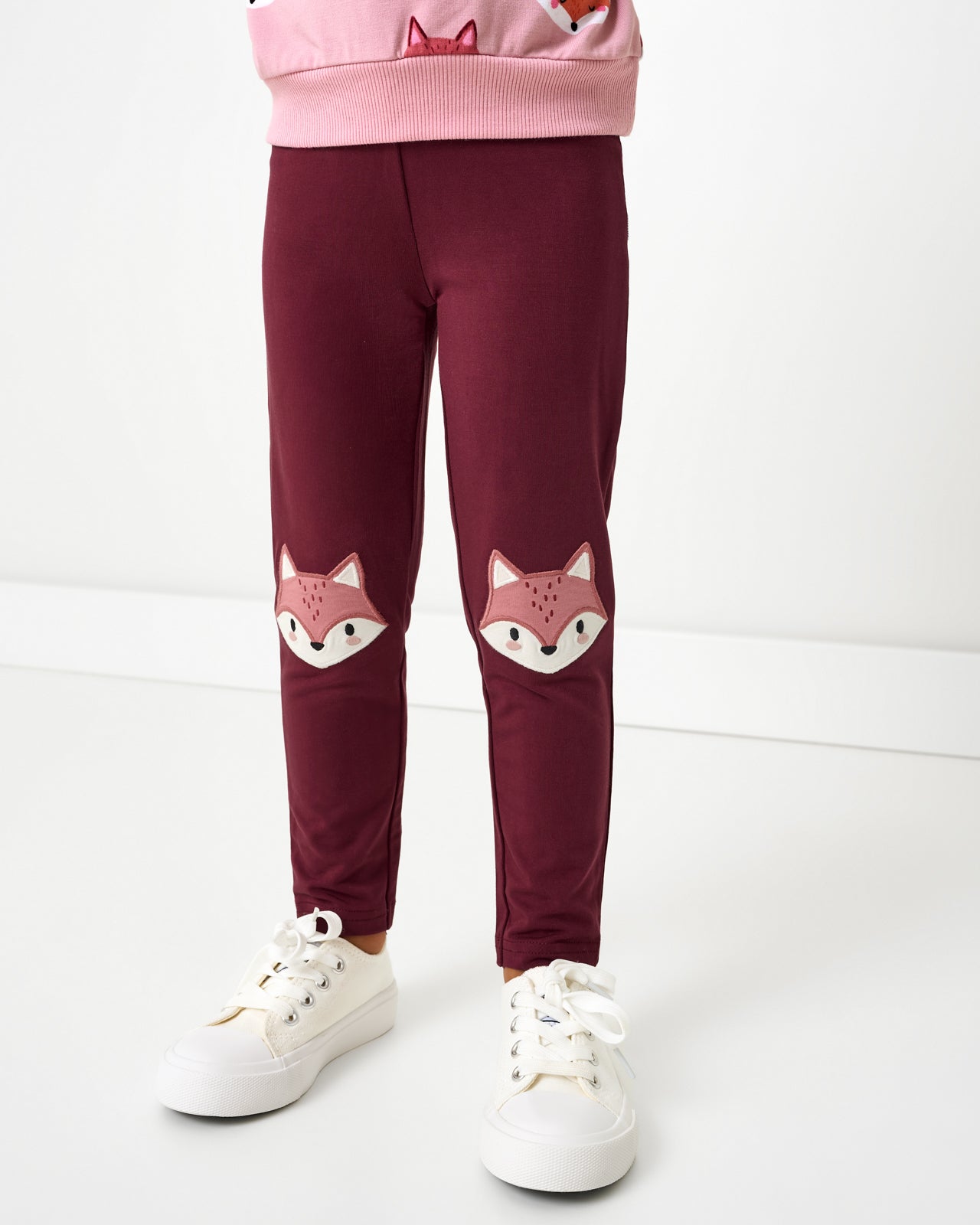 Girl wearing the Fox Knee Patch Legging