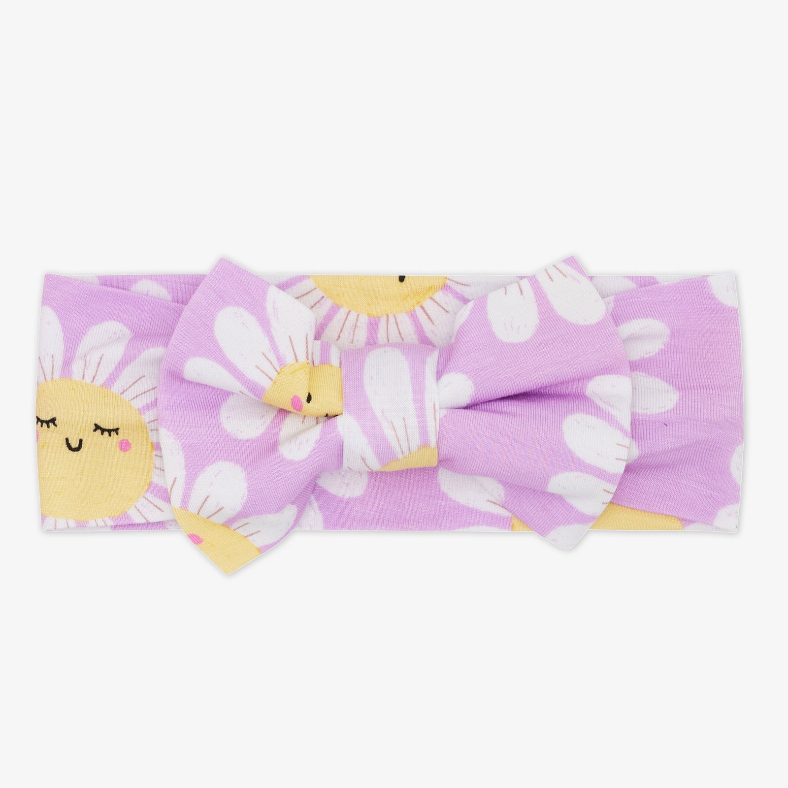 Flat lay of the Flower Power Luxe Bow Headband