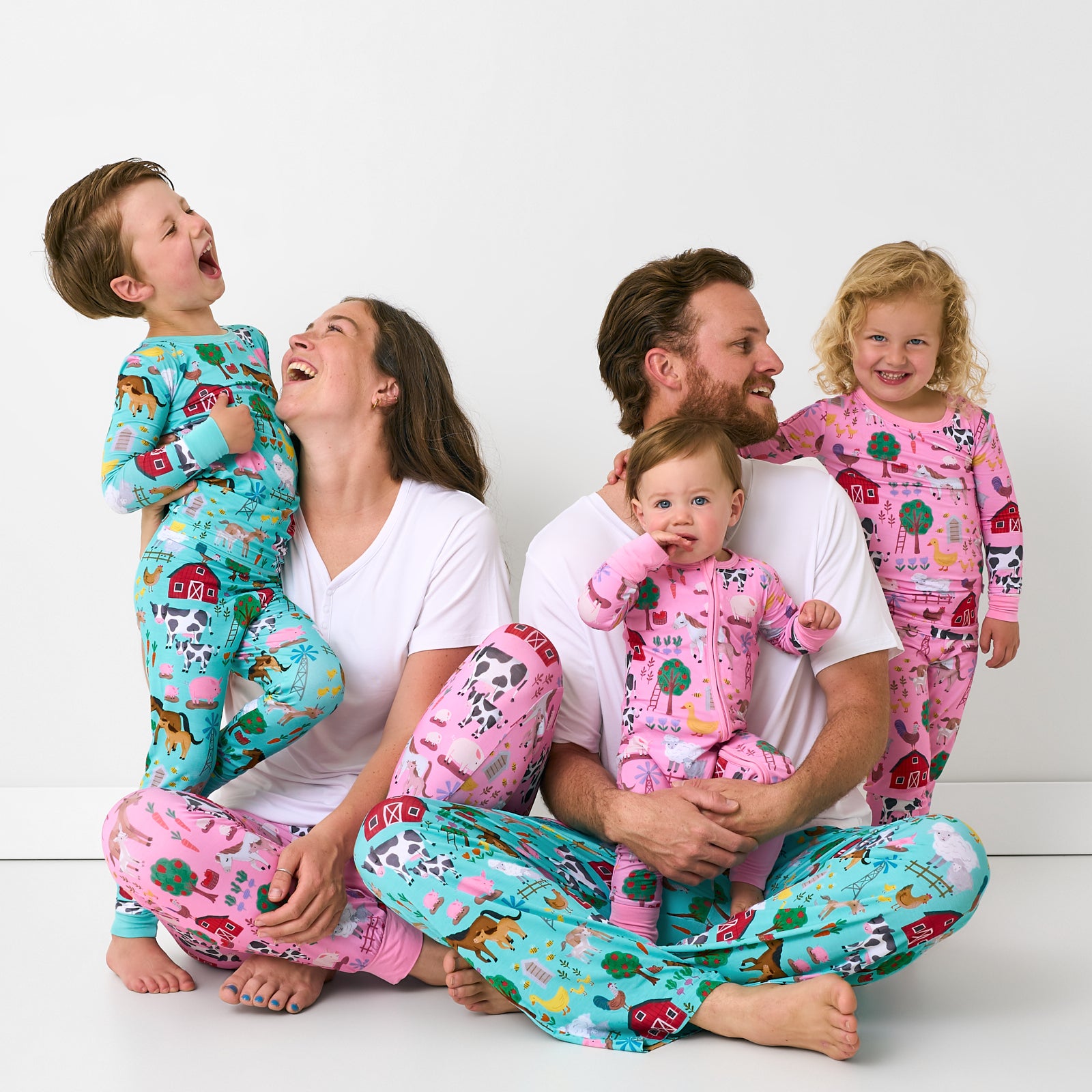 Family of five wearing matching Farm Fam family matching pajamas