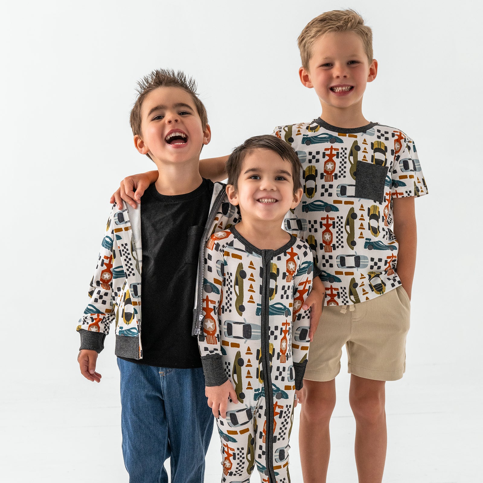 Three children wearing matching Fast Lane styles