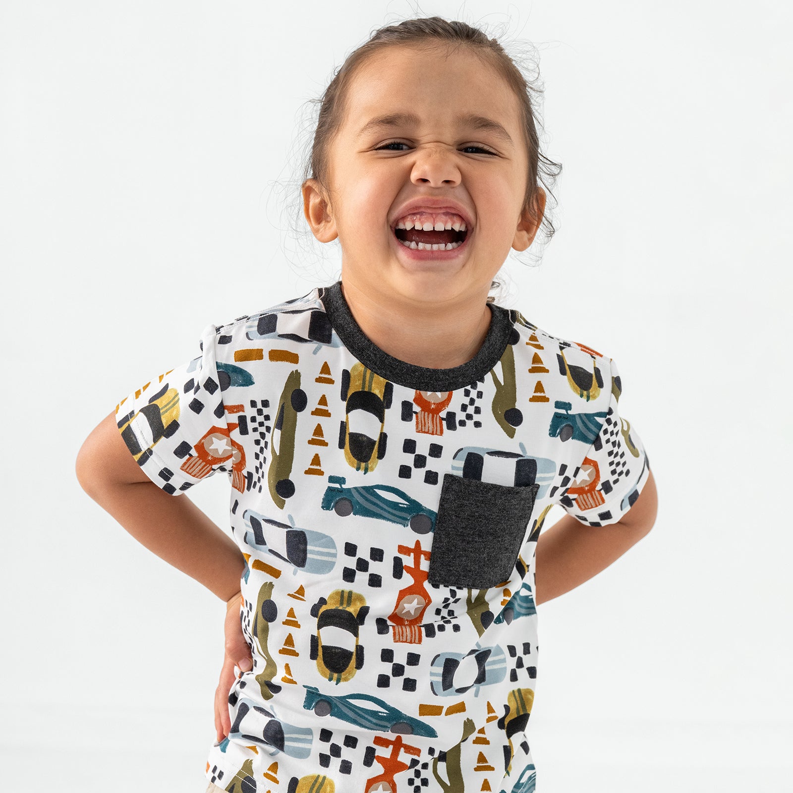 Close up of child wearing the Fast Lane Short Sleeve Relaxed Pocket Tee