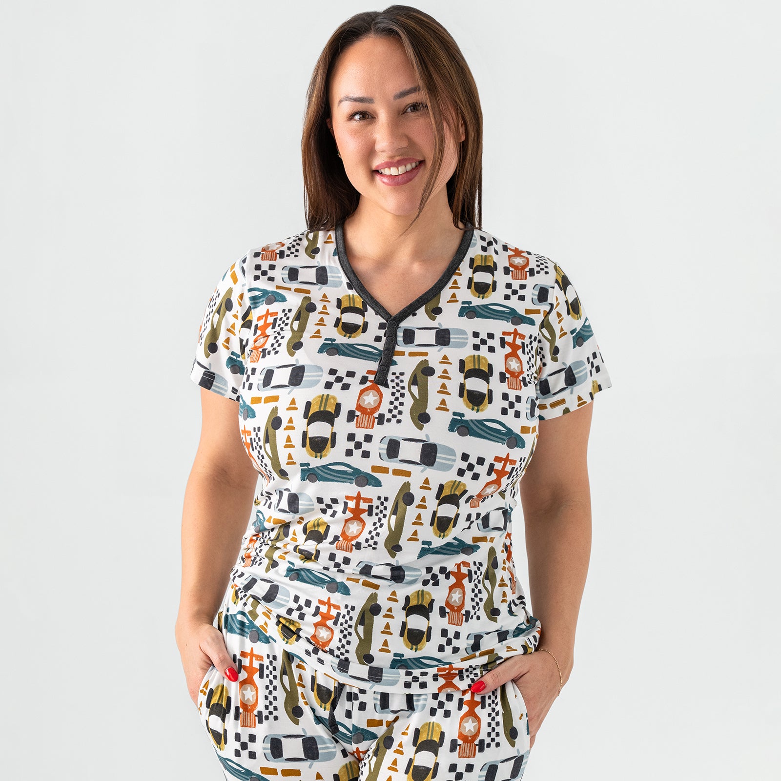 Standing woman wearing the Fast Lane Women's Short Sleeve Pajama Top