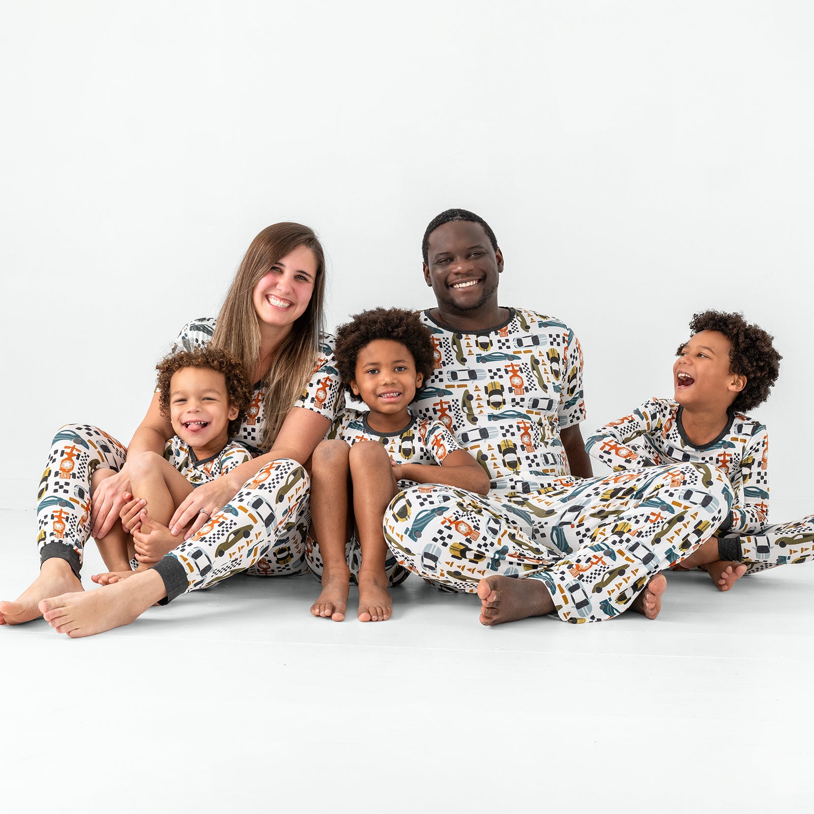 Family of five wearing matching Fast Lane Pajamas