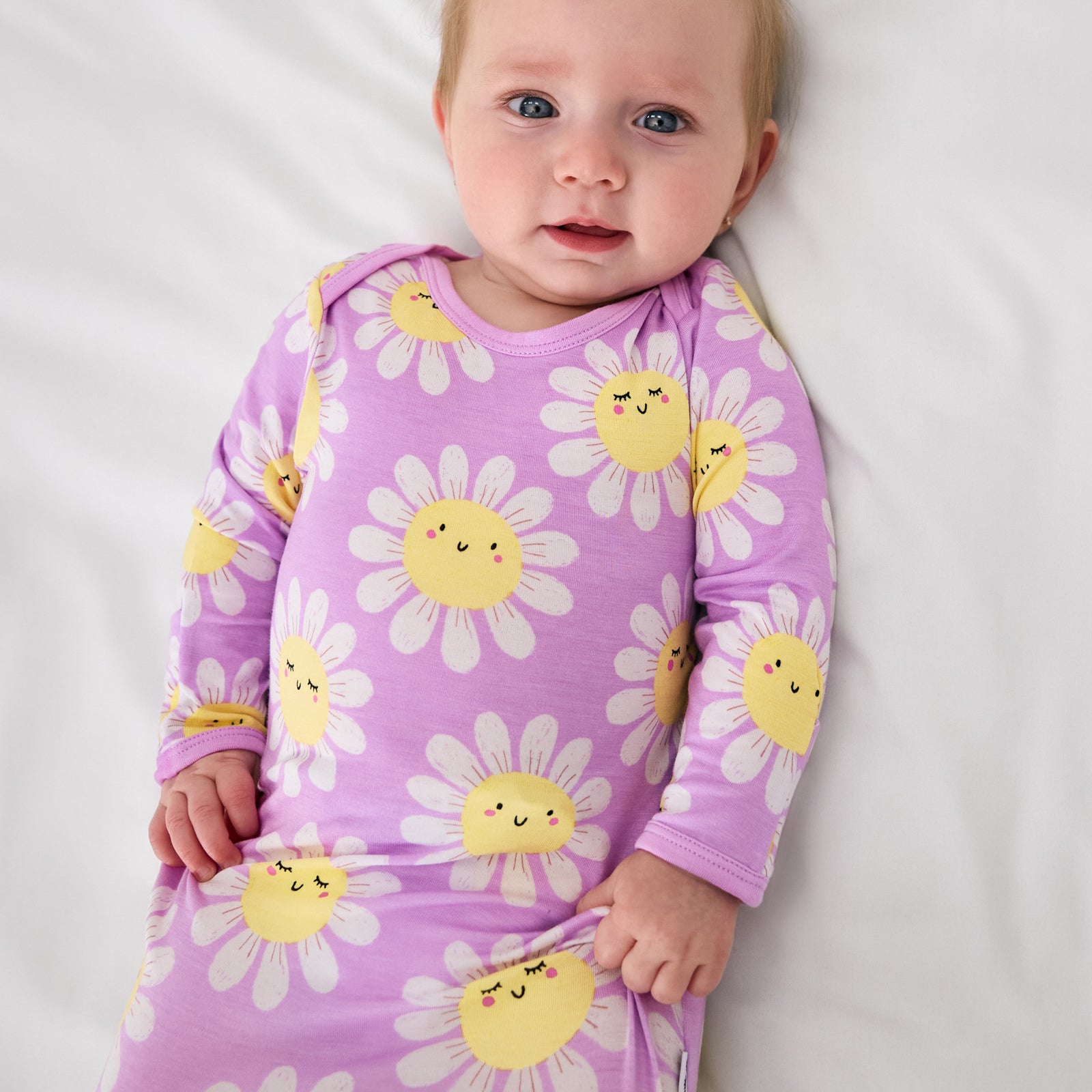 Close up of child wearing the Flower Power Infant Gown