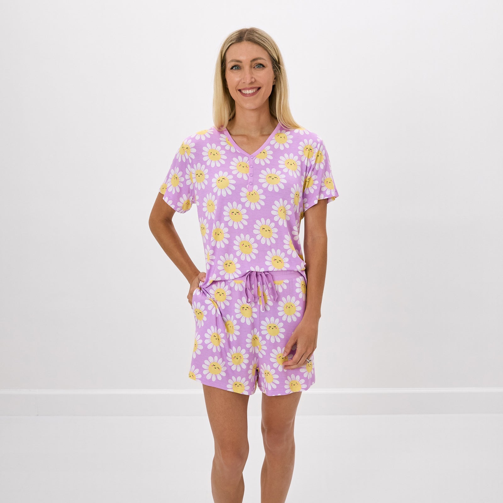 Standing woman wearing the Flower Power Women's Pajama Shorts and matching top