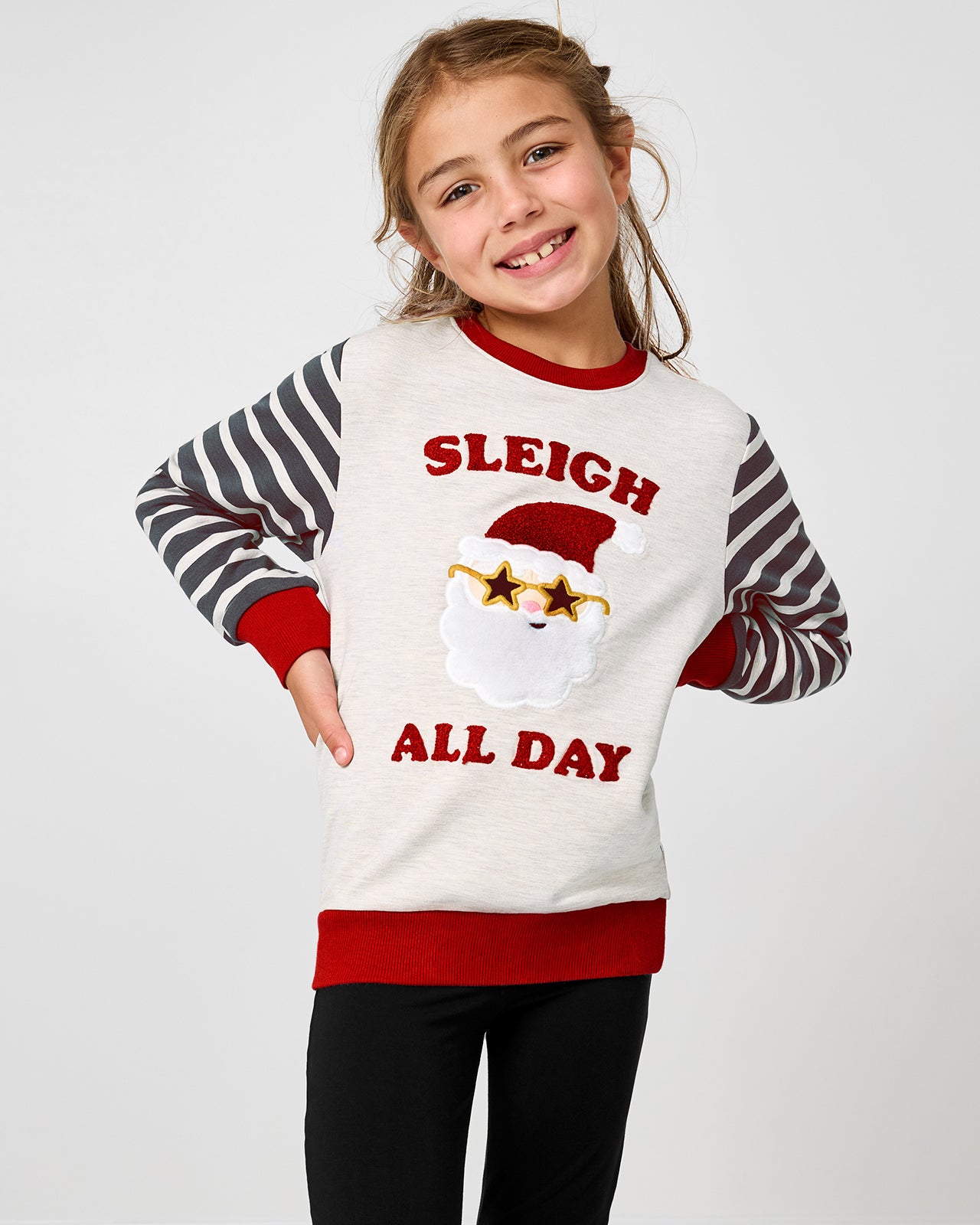 Girl wearing the Sleigh All Day Crewneck Sweatshirt