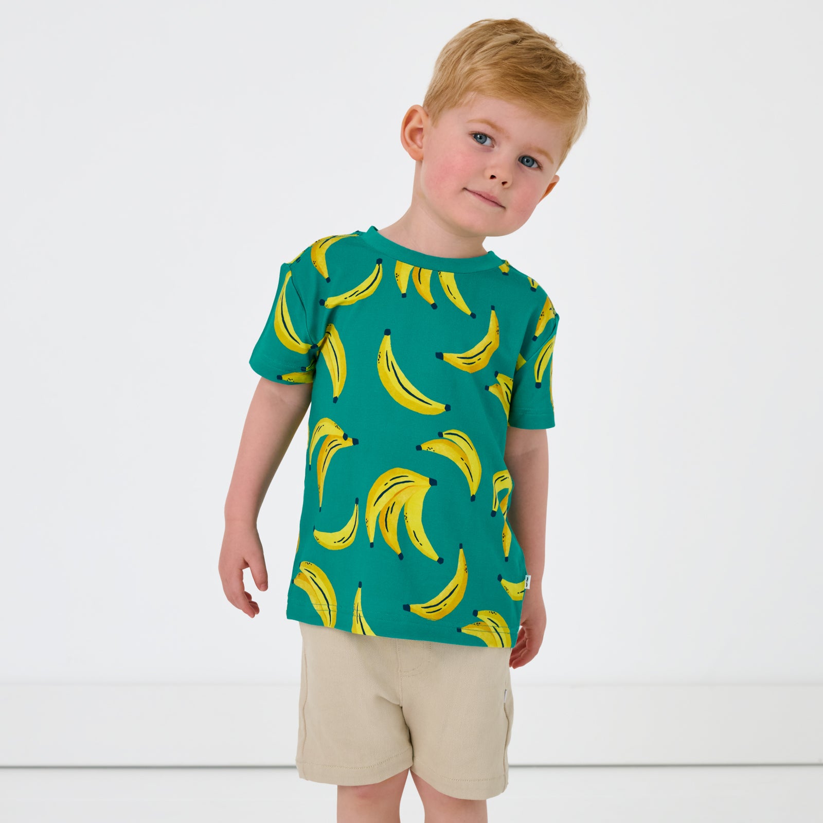 Child wearing the Go Bananas Relaxed Tee with Light Khaki Chino Shorts