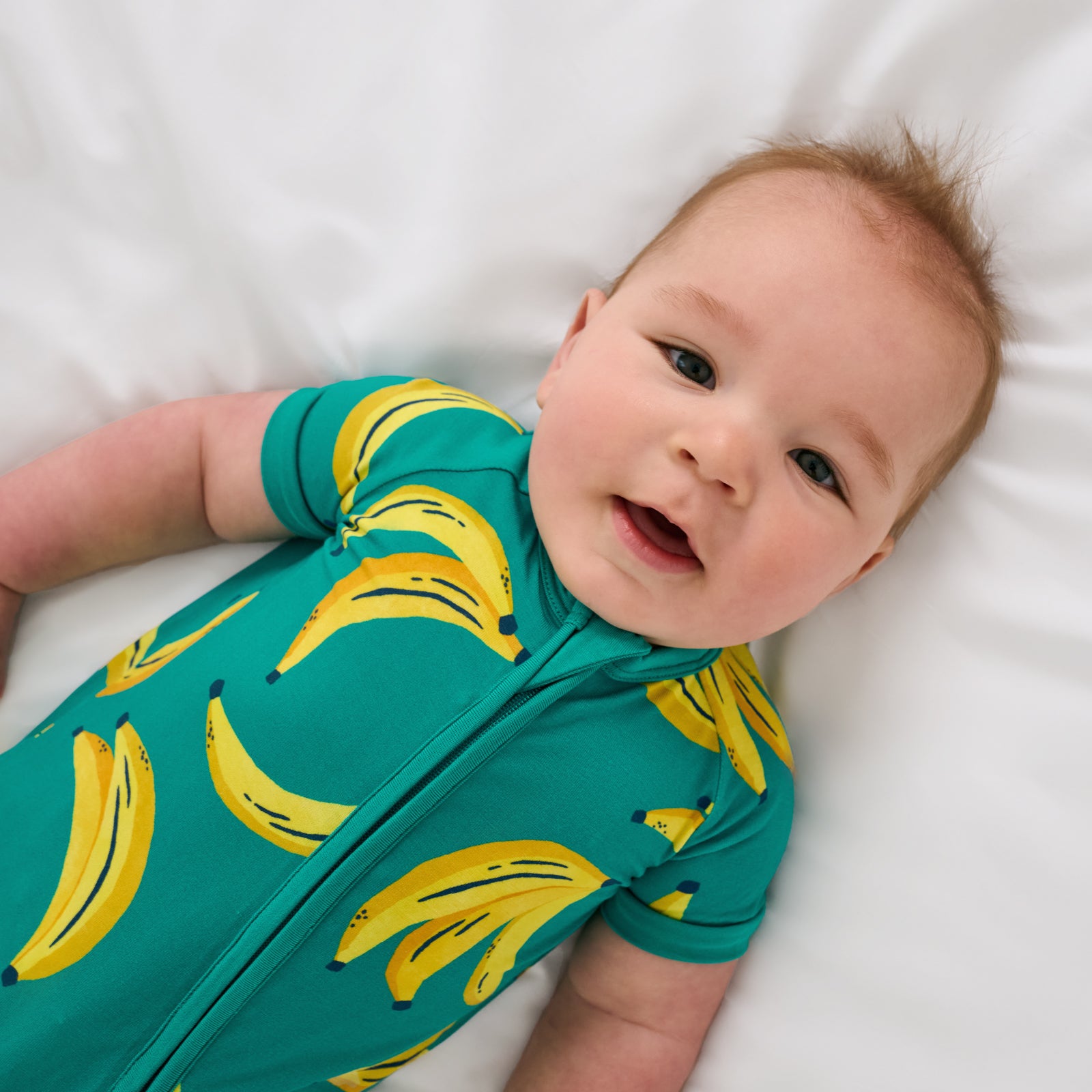 Aerial view of child wearing the Go Bananas Shorty Zippy