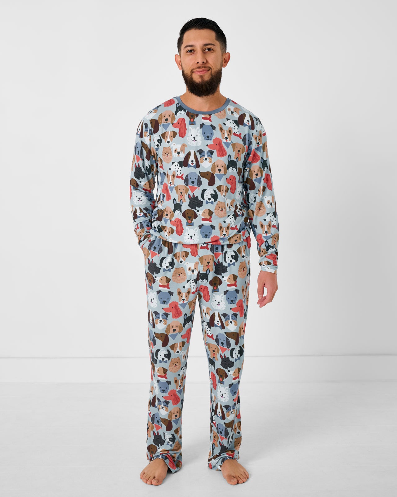 Man wearing the Gray Puppy Parade Men's Pajama Pants and Top
