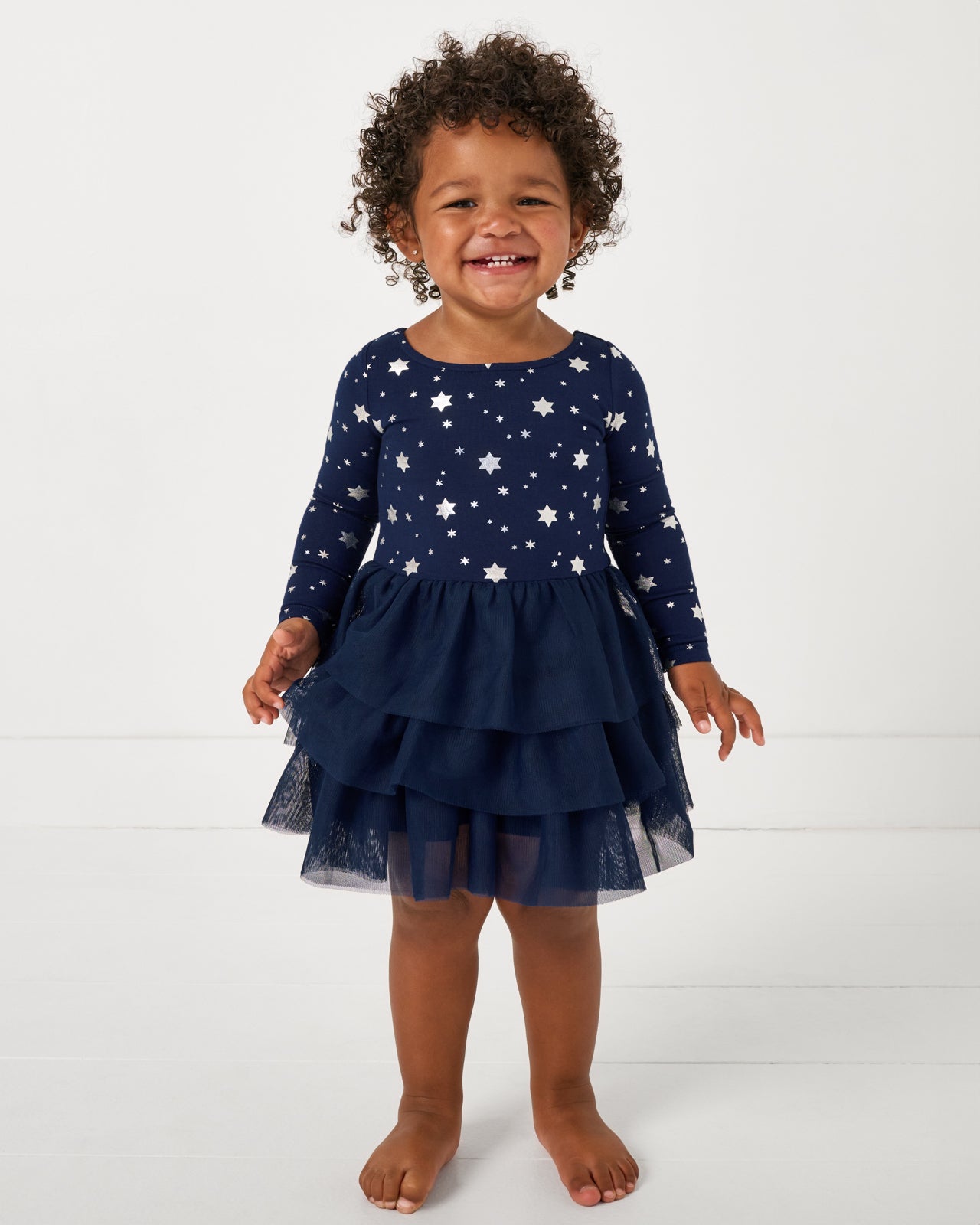 Toddler wearing the Hanukkah Stars Tiered Tutu Dress with Bloomer
