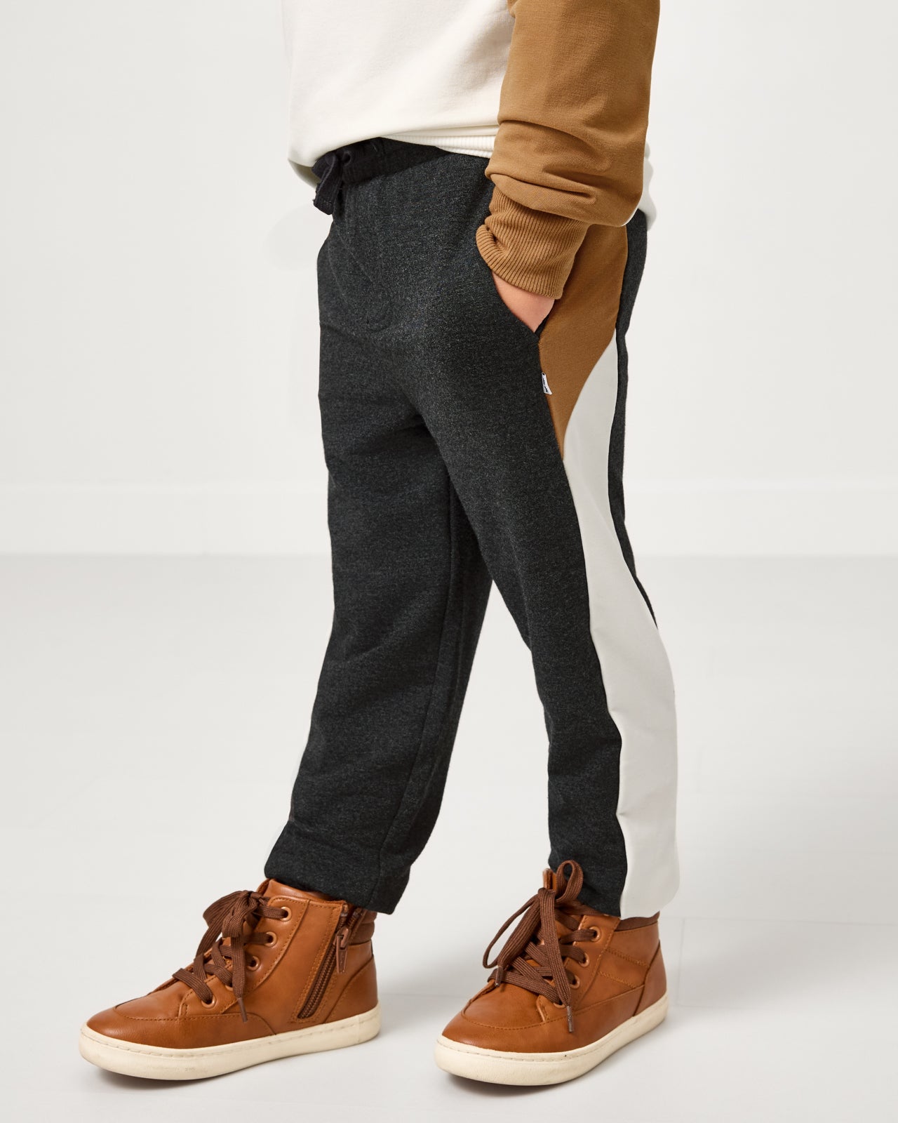 Close up of boy wearing the Heather Black Panel Jogger