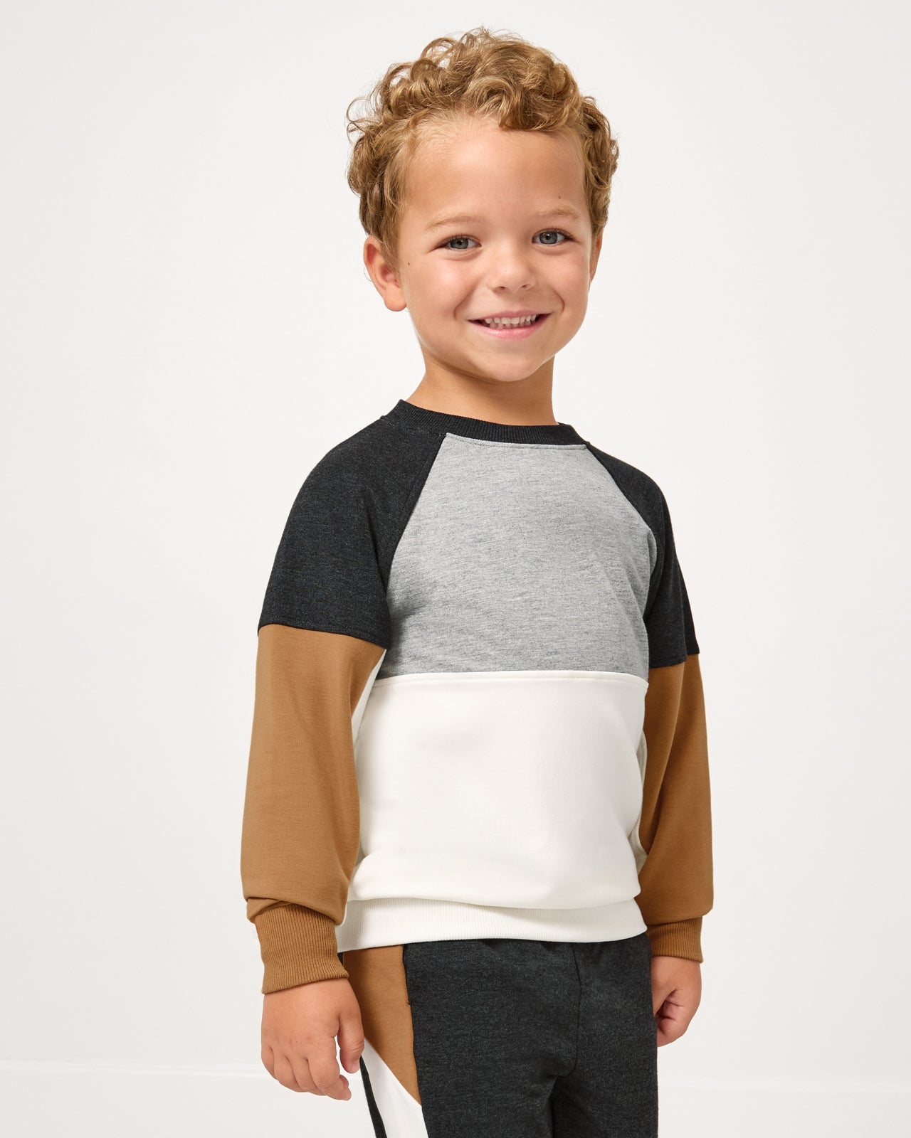 Boy wearing the Heather Gray Panel Crewneck