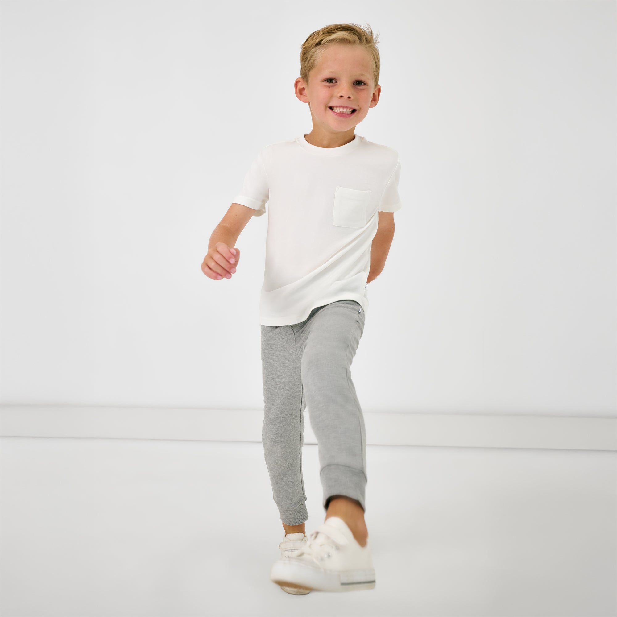 Child in motion wearing the Heather Gray Jogger