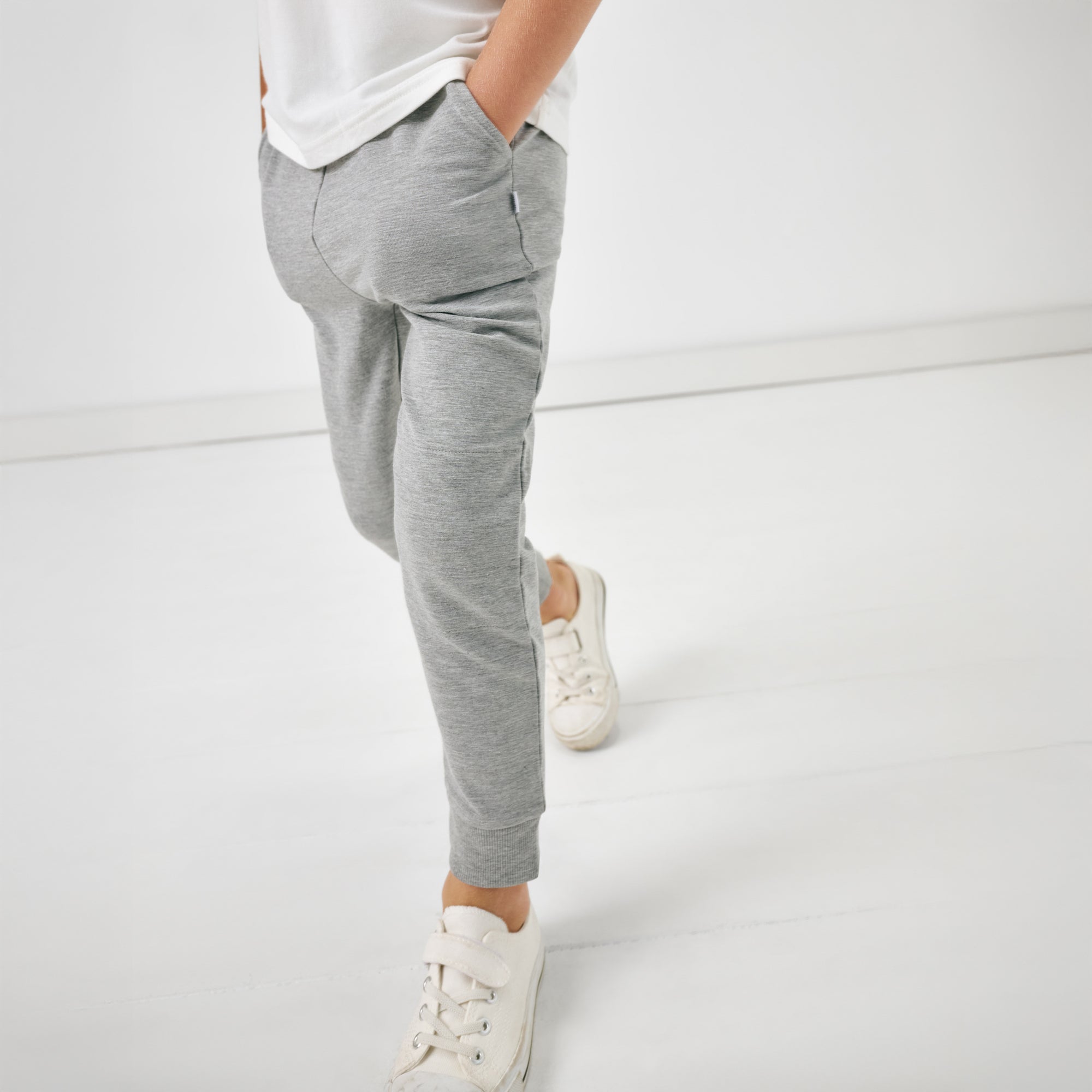 Close up of child wearing the Heather Gray Jogger