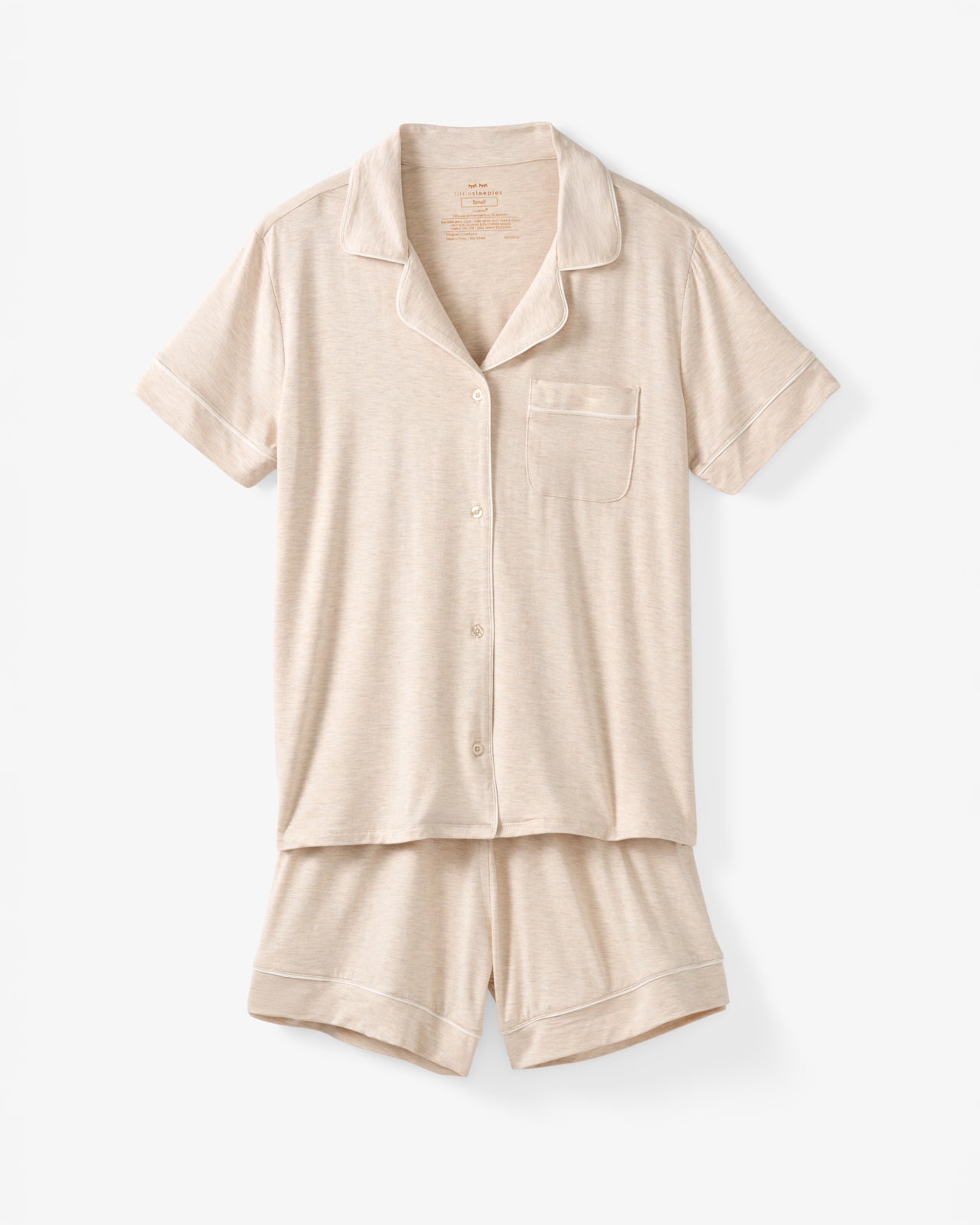Flat lay of the Heather Oatmeal Women's Short Sleeve & Shorts Pajama Set