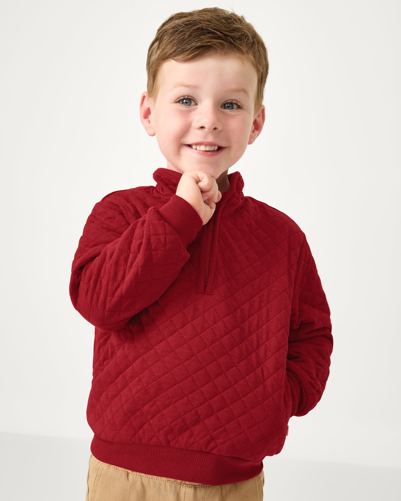 Boy wearing the Holiday Red Quilted Zip Pullover