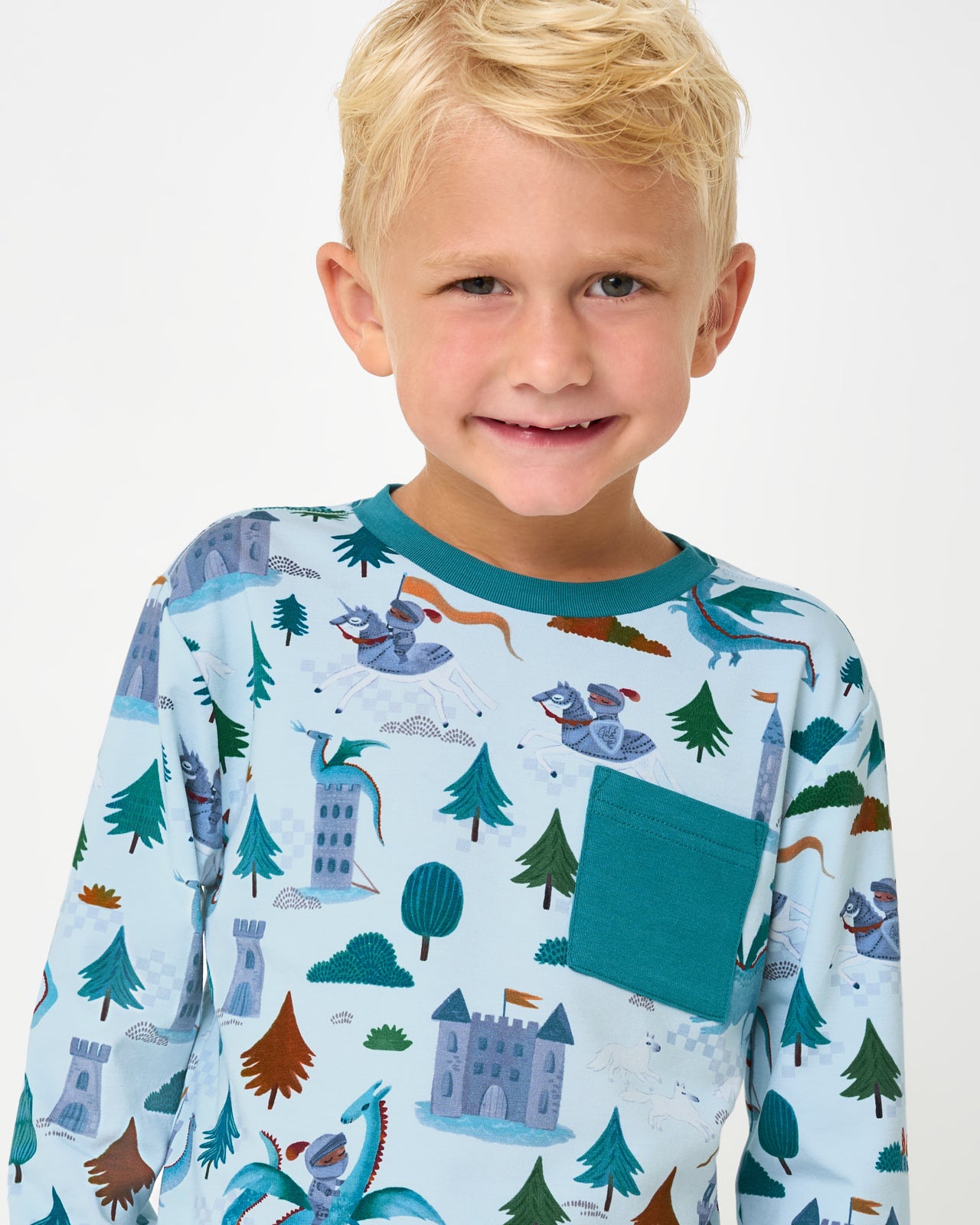 Close up of boy wearing the Knight's Quest Relaxed Pocket Tee