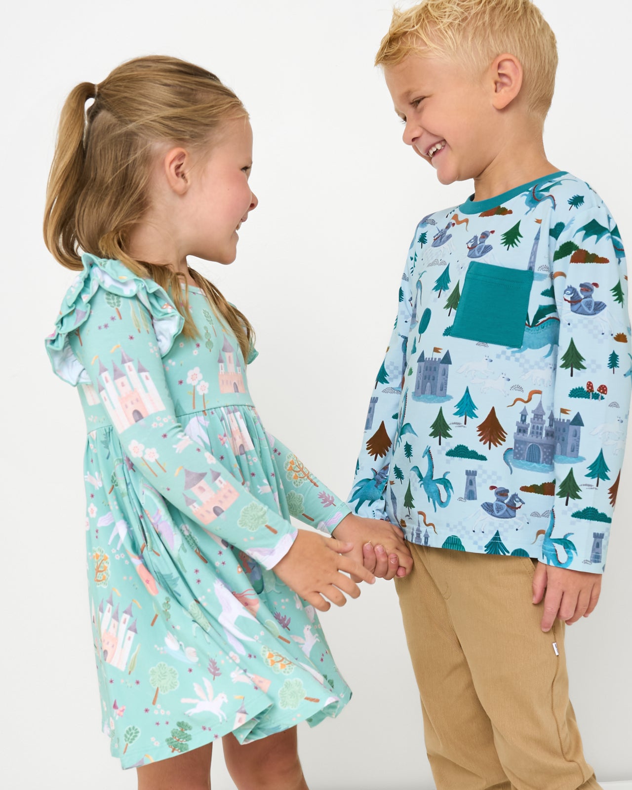 Boy and girl wearing Enchanted Fairytale and Knights Quest play styles