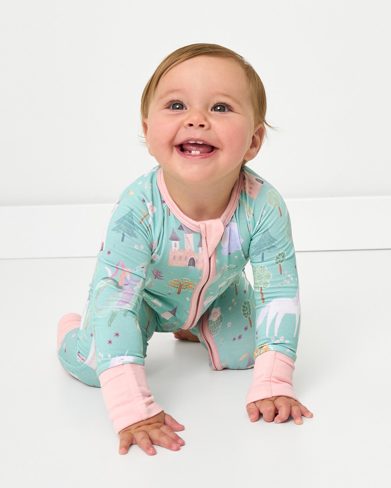 Crawling baby wearing the Enchanted Fairytale Zippy