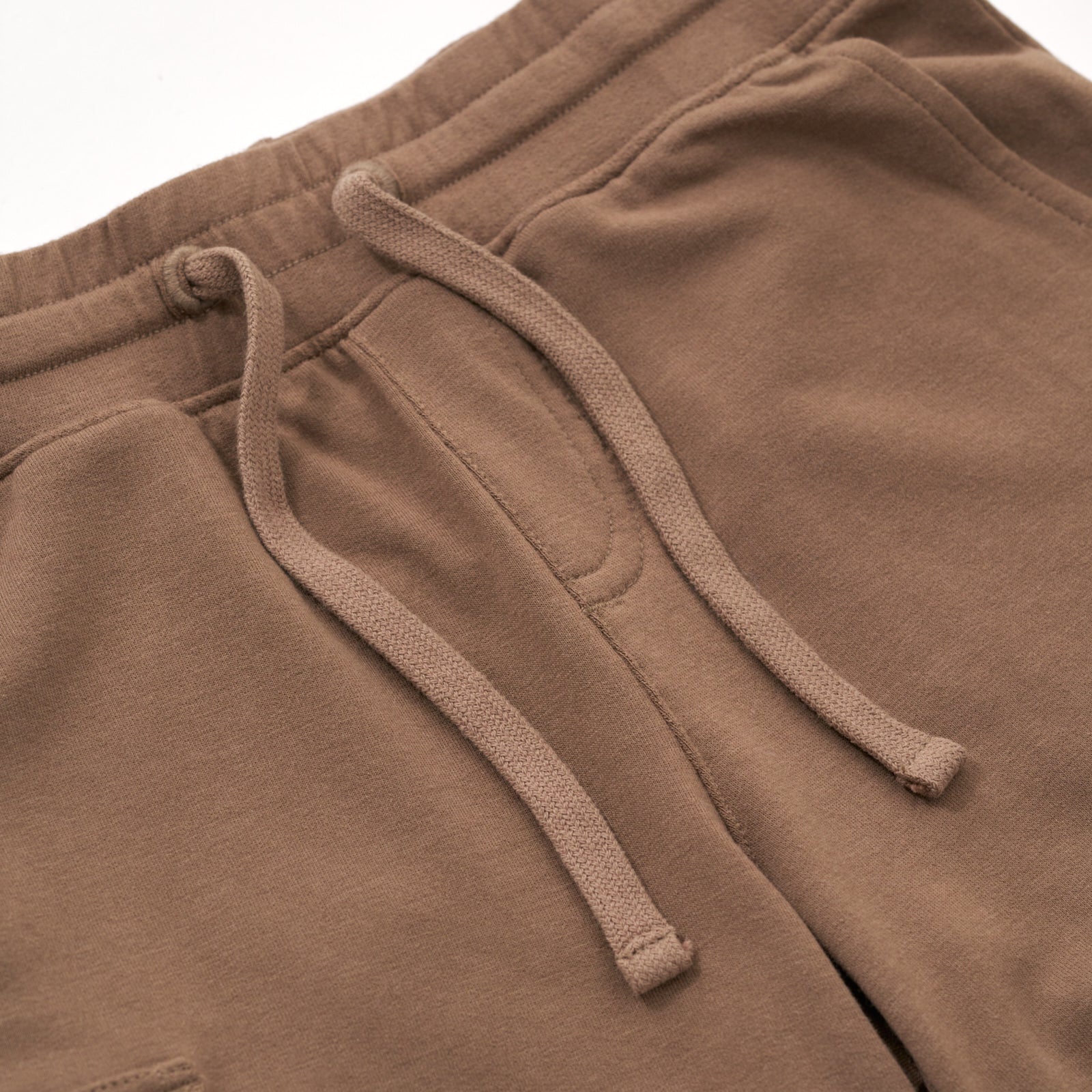 Close up flat lay image of the drawstring waist on the Vintage Brown Cargo Shorts