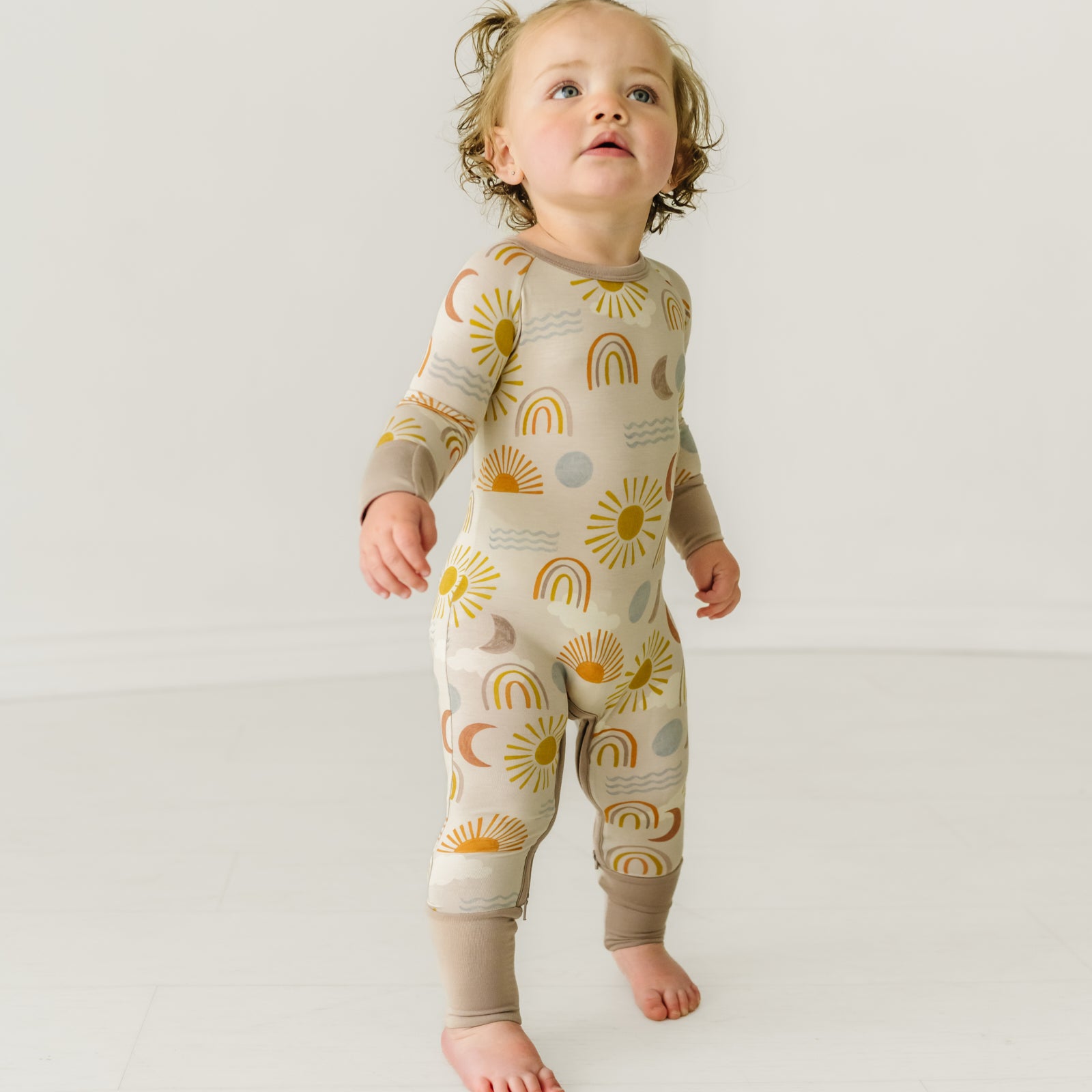 Child wearing a Desert Crescent Zippy