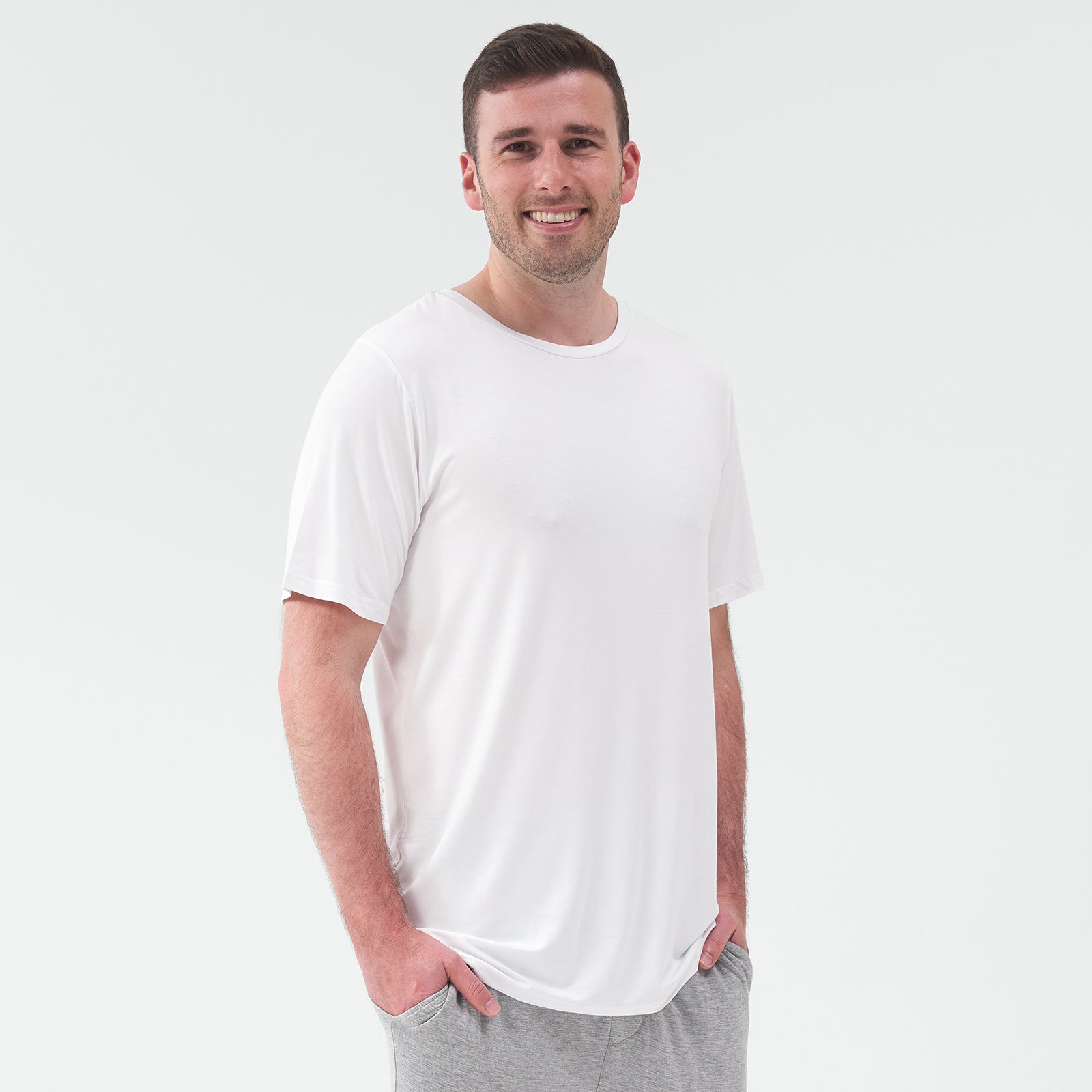 Standing man wearing the Bright White Men's Short Sleeve Pajama Top