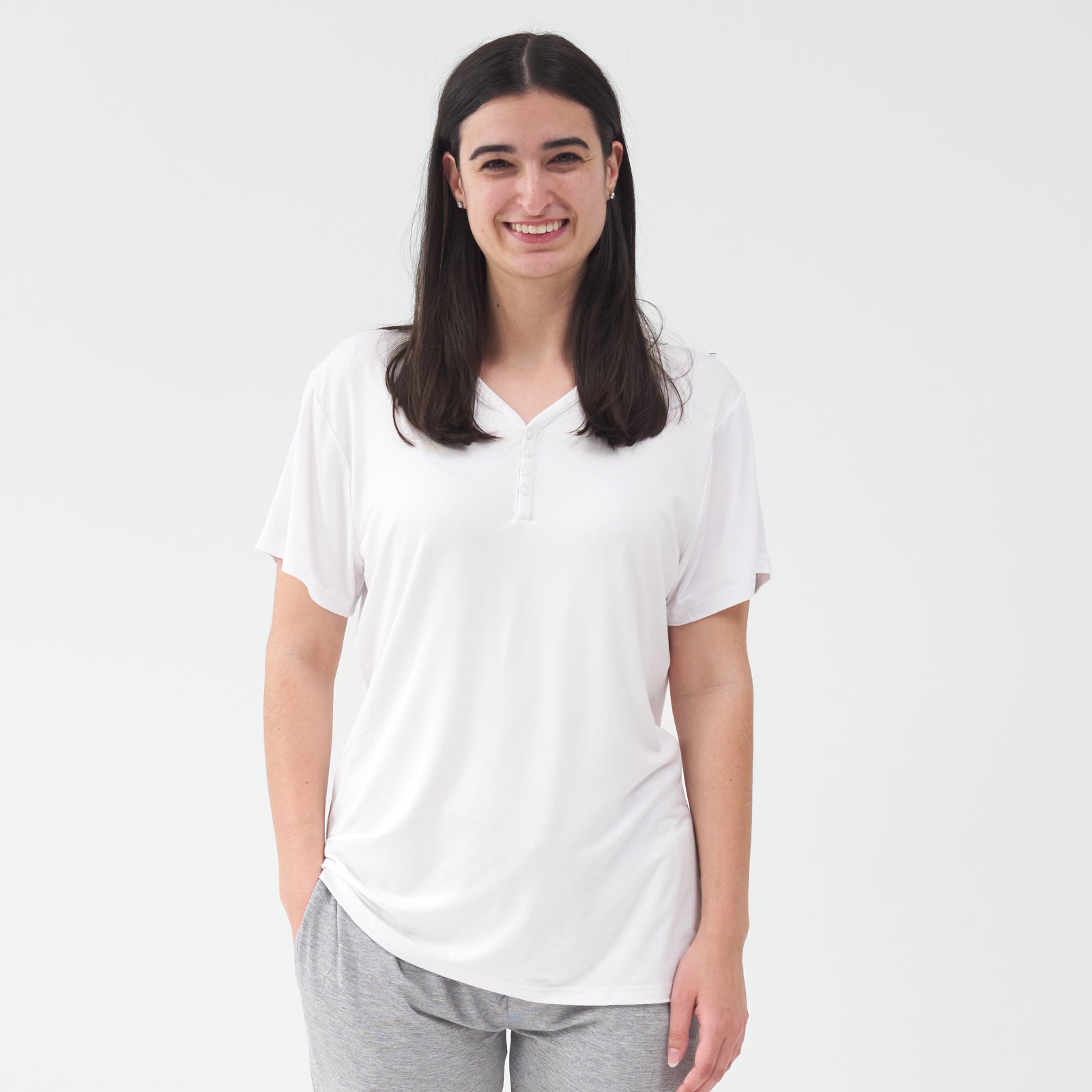 Standing woman wearing the Bright White Women's Short Sleeve Pajama Top
