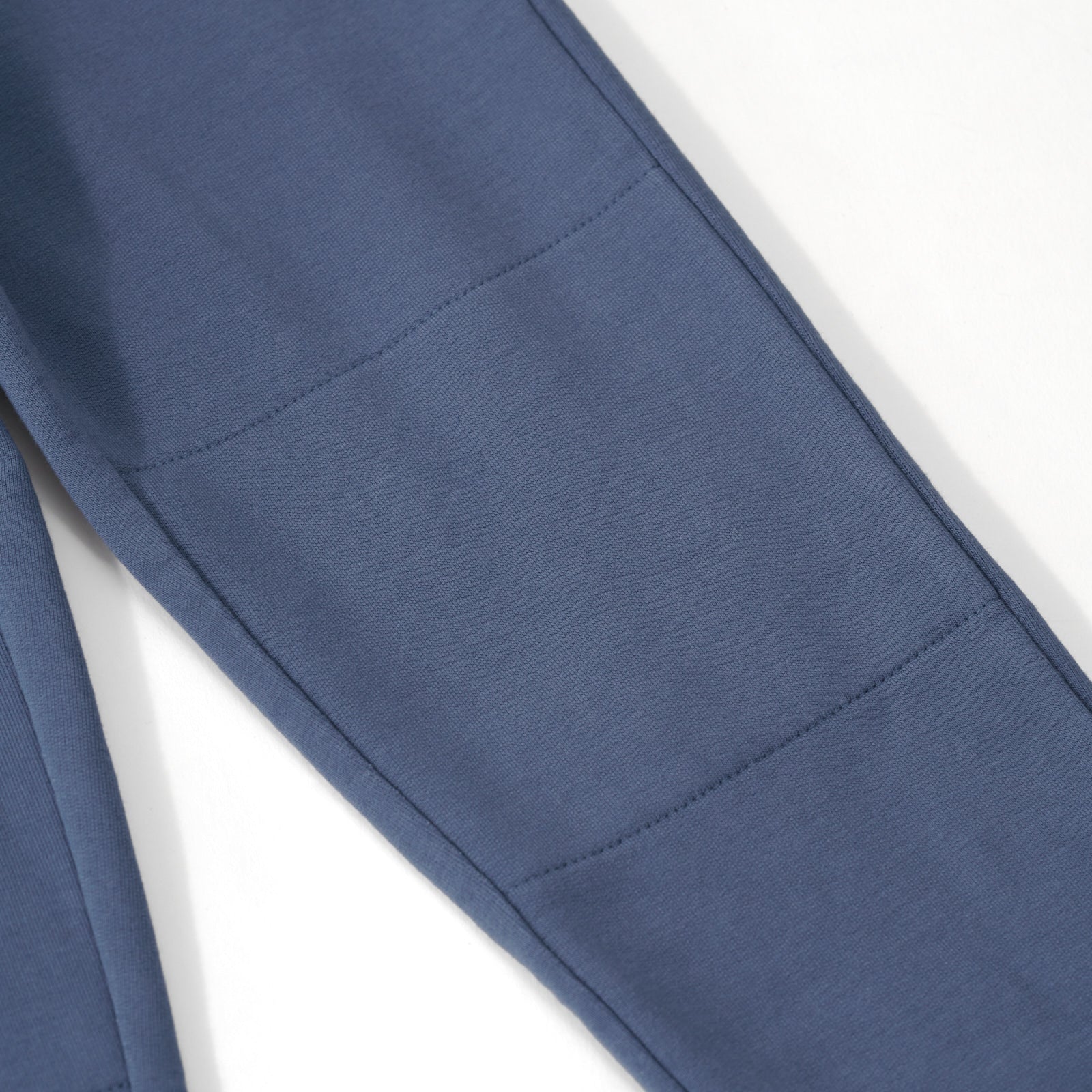 Close up of the knee detail for the Vintage Navy Jogger